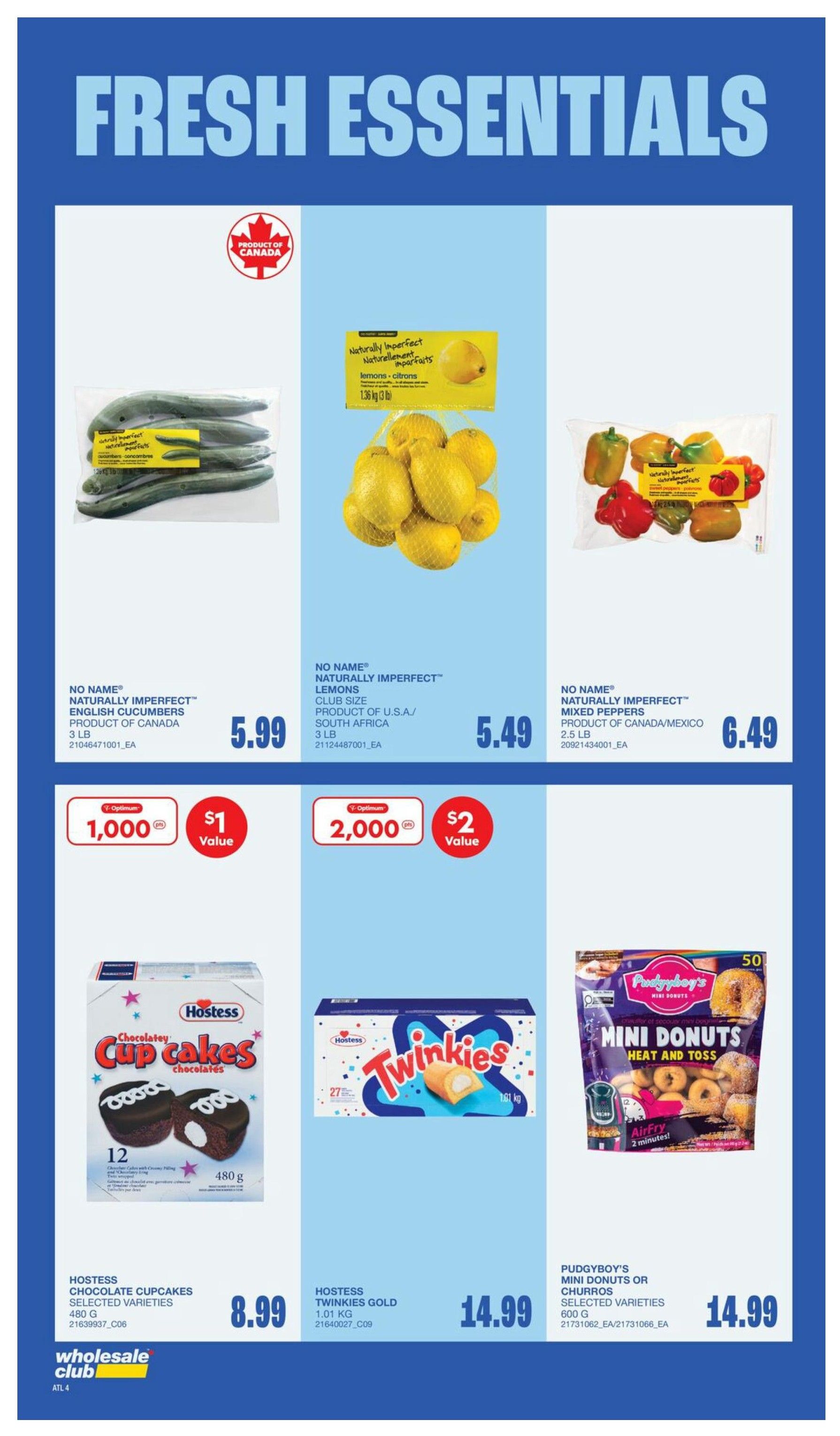 Wholesale Club flyer page 9 featuring 'Fresh Essentials'. On this page, find No Name Naturally Imperfect English Cucumbers, 3 lb, for $5.99. Also, No Name Naturally Imperfect Lemons, 3 lb, from the U.S.A./South Africa for $5.49. No Name Naturally Imperfect Mixed Peppers, 2.5 lb, from Canada/Mexico are priced at $6.49. There are Optimum offers: 1,000 points for $1 value on the cucumbers and 2,000 points for $2 value on the lemons. In the snack section, Hostess Chocolatey Cupcakes, selected varieties, 480 g, are $8.99. Hostess Twinkies Gold, 1.01 kg, are $14.99. Pudgyboy's Mini Donuts or Churros, selected varieties, 600 g, are also $14.99.