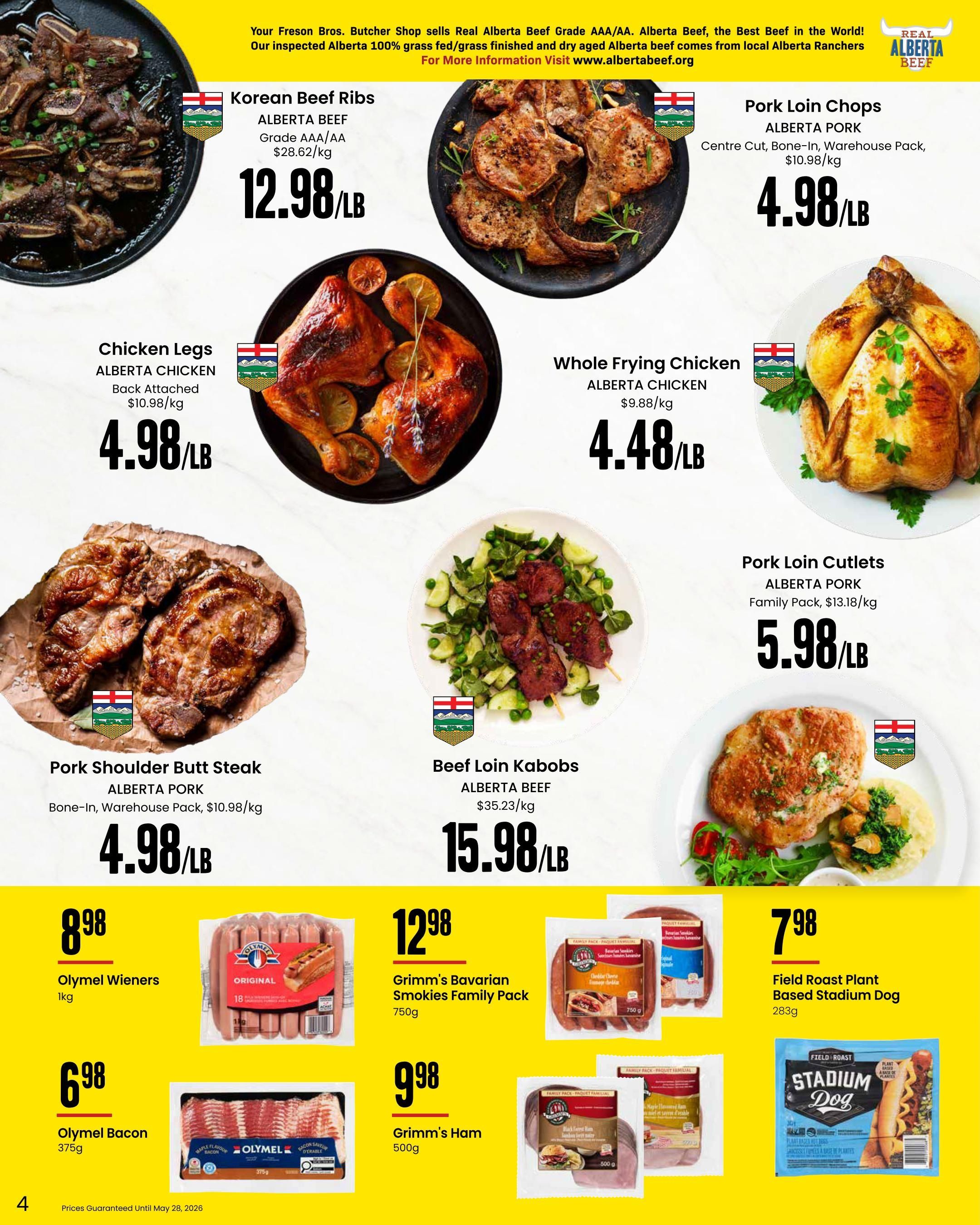 Freson Bros. flyer page 4 features a variety of meat products. Highlighted are Korean Beef Ribs for $12.98/lb, Alberta Pork Loin Chops for $4.98/lb, Alberta Chicken Legs for $4.98/lb, Whole Frying Chicken for $4.48/lb, Alberta Pork Shoulder Butt Steak for $4.98/lb, and Alberta Beef Loin Kabobs for $15.98/lb. Also available are Olymel Wieners 1kg for $8.98, Olymel Bacon 375g for $6.98, Grimm's Bavarian Smokies Family Pack 750g for $12.98, Grimm's Ham 500g for $9.98, and Field Roast Plant Based Stadium Dog 283g for $7.98. Prices are guaranteed until May 28, 2026.