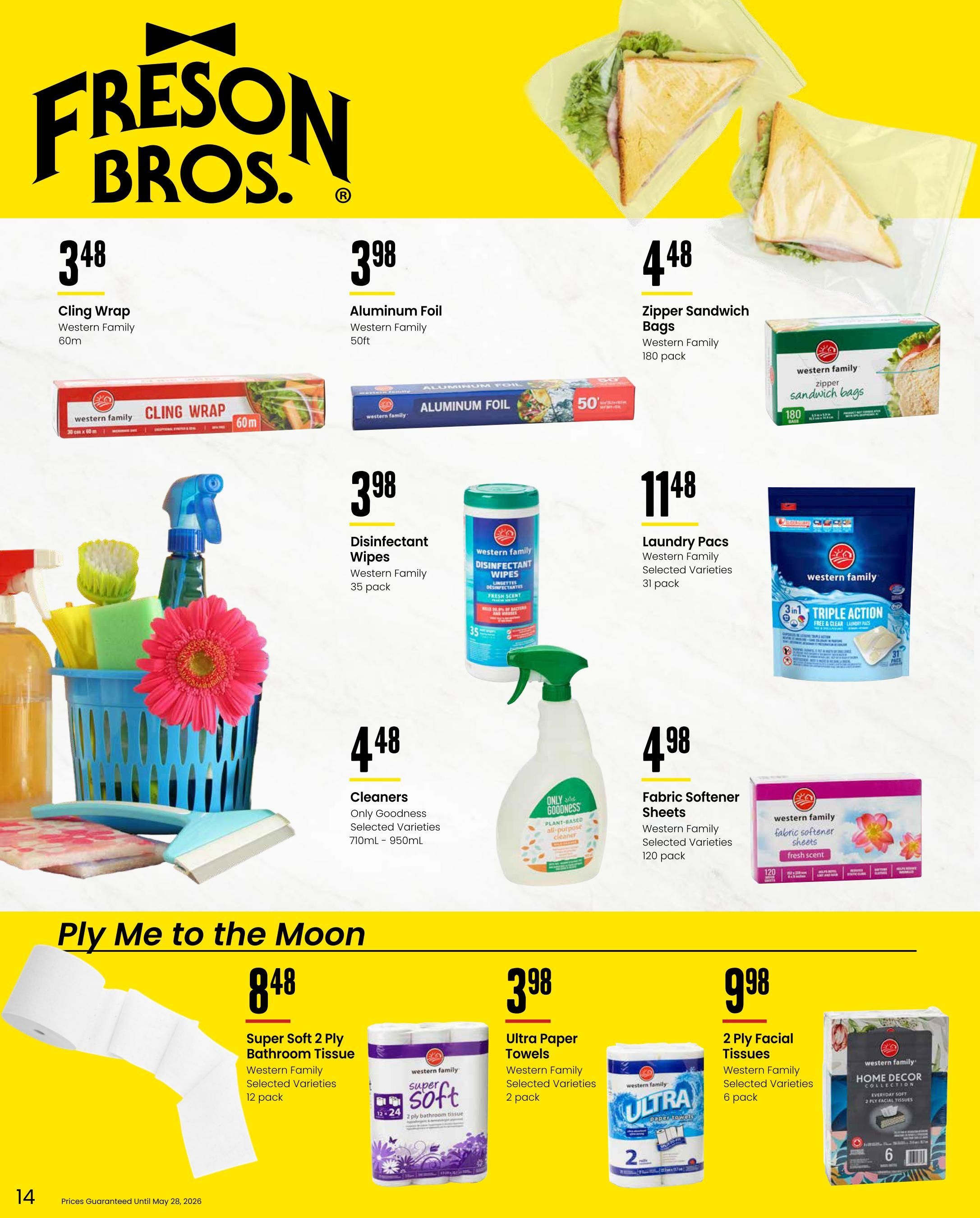 Freson Bros. flyer page 14 features household essentials. Western Family Cling Wrap is $3.48 for 60m. Western Family Aluminum Foil is $3.98 for 50ft. Western Family Zipper Sandwich Bags are $4.48 for a 180 pack. Western Family Disinfectant Wipes are $3.98 for a 35 pack. Only Goodness Cleaners, selected varieties, are $4.48 for 710mL - 950mL. Western Family Laundry Pacs, selected varieties, are $11.48 for a 31 pack. Western Family Fabric Softener Sheets, selected varieties, are $4.98 for a 120 pack. The 'Ply Me to the Moon' section includes Western Family Super Soft 2 Ply Bathroom Tissue, selected varieties, for $8.48 per 12 pack. Western Family Ultra Paper Towels, selected varieties, are $3.98 for a 2 pack. Western Family 2 Ply Facial Tissues, selected varieties, are $9.98 for a 6 pack. Prices are guaranteed until May 28, 2026.
