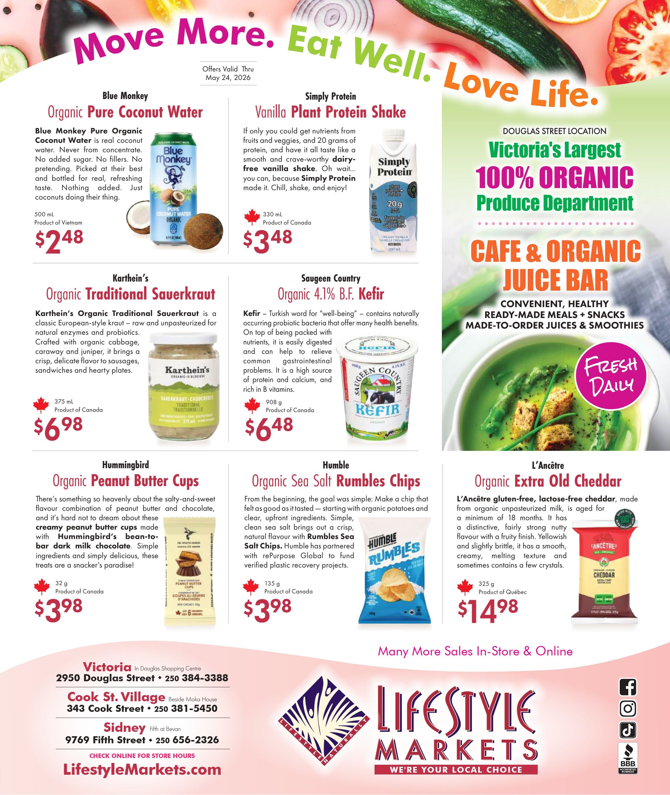 Lifestyle Markets flyer specials, page 2. Offers valid through May 24, 2026. Featuring Blue Monkey Organic Pure Coconut Water, 500 ml, product of Vietnam, for $2.48. Simply Protein Vanilla Plant Protein Shake, 330 ml, product of Canada, for $3.48. Karthein's Organic Traditional Sauerkraut, 375 ml, product of Canada, for $6.98. Saugeen Country Organic 4.1% B.F. Kefir, 908 g, product of Canada, for $6.48. Hummingbird Organic Peanut Butter Cups, 32 g, product of Canada, for $3.98. Humble Organic Sea Salt Rumbles Chips, 135 g, product of Canada, for $3.98. L'Ancêtre Organic Extra Old Cheddar, 325 g, product of Québec, for $14.98. The flyer also highlights Victoria's Largest 100% Organic Produce Department and a Cafe & Organic Juice Bar with convenient, healthy ready-made meals, snacks, and made-to-order juices and smoothies, with 'Fresh Daily' indicated. Store locations and contact information are provided for Victoria (Douglas Street), Cook St. Village, and Sidney. Visit LifestyleMarkets.com for more information.