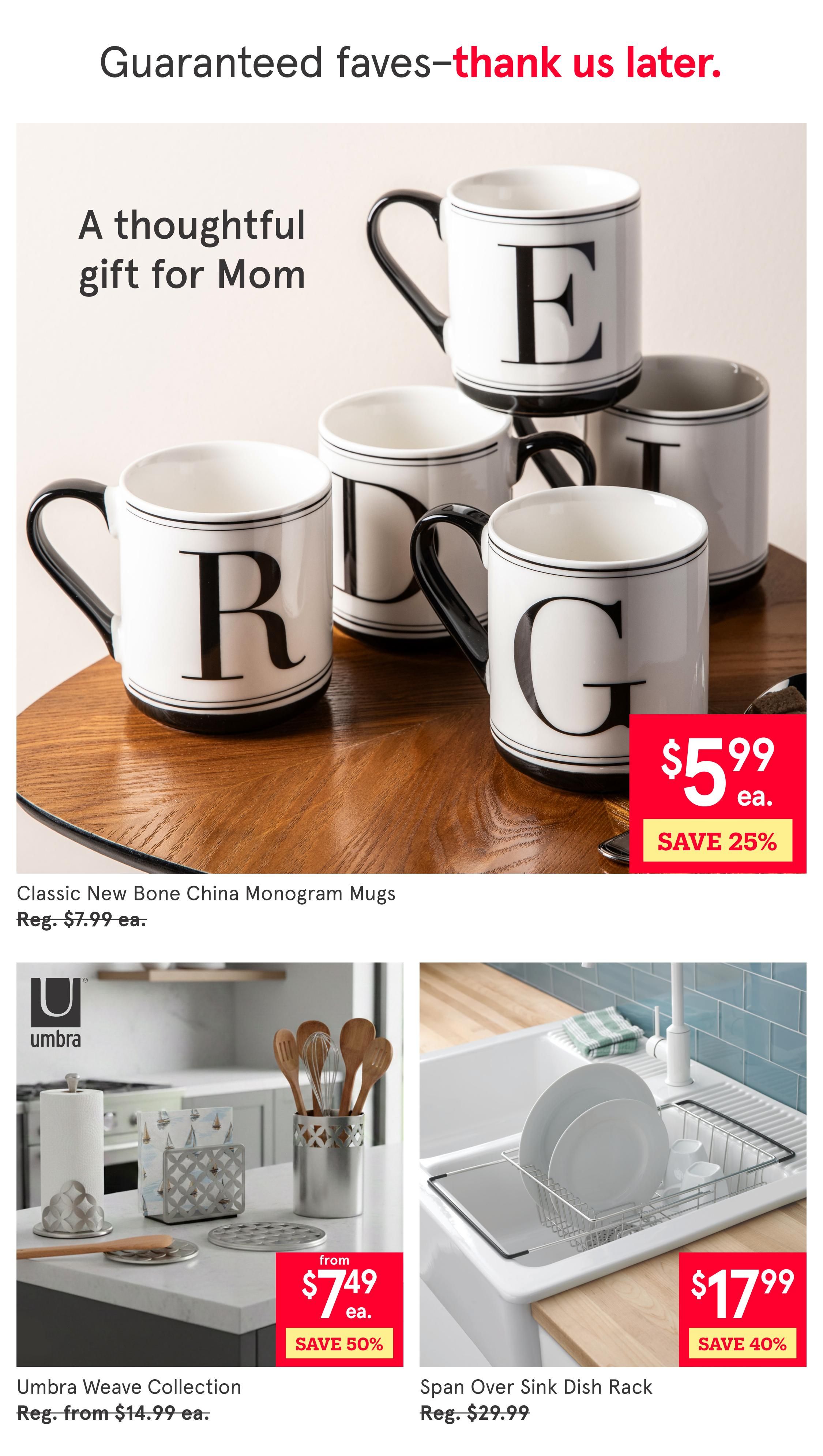 Kitchen Stuff Plus flyer page 4 features a selection of kitchenware. Top section showcases Classic New Bone China Monogram Mugs, perfect for gifting Mom, on sale for $5.99 each, a 25% saving from the regular price of $7.99. Below, the Umbra Weave Collection is featured with items like a paper towel holder and utensil holder, starting from $7.49 each, offering a 50% discount from the regular price of $14.99. To the right, a Span Over Sink Dish Rack is available for $17.99, saving 40% off the regular price of $29.99.