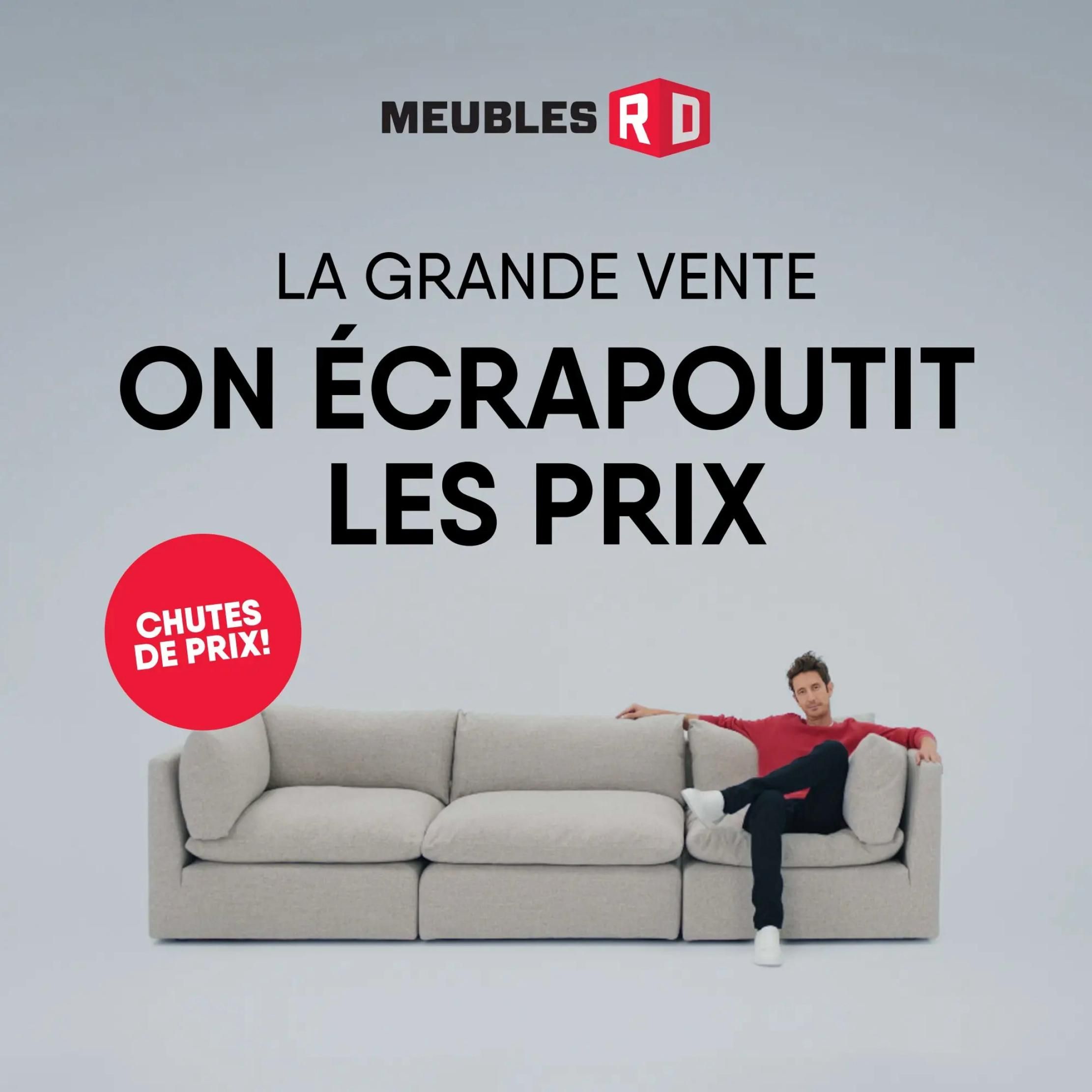 RD Furniture flyer cover page announcing 'The Big Sale: We're Crushing Prices!' with a red circle graphic stating 'Price Drops!'. The image features a man relaxing on a large, light-coloured sectional sofa against a plain background.