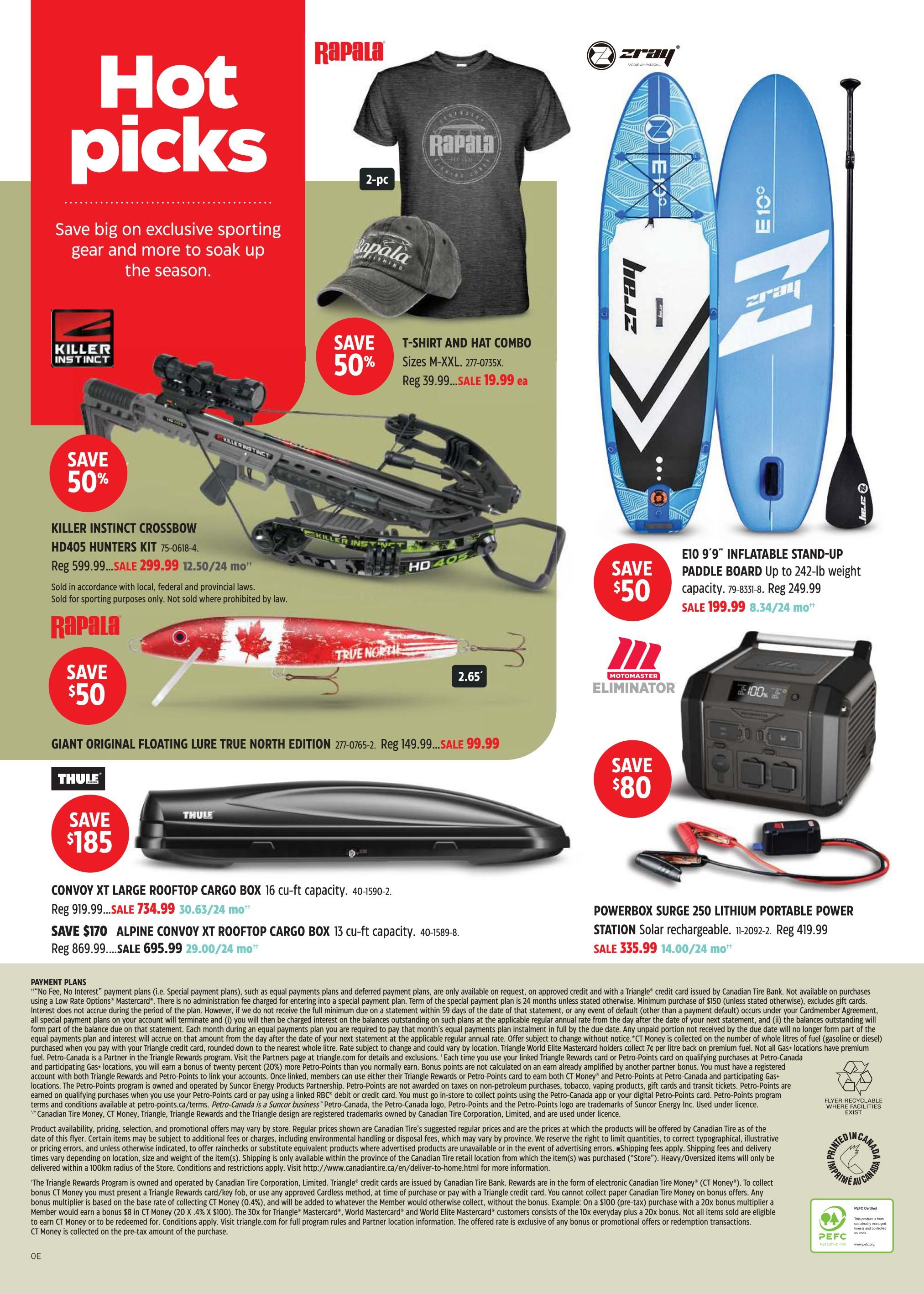 Canadian Tire Hot Picks flyer page featuring exclusive sporting gear. Includes a Killer Instinct HD405 Hunters Kit crossbow on sale for $299.99 (50% off), originally $599.99. Also featured is a Rapala Giant Original Floating Lure True North Edition for $99.99, originally $149.99. A Rapala T-Shirt and Hat combo is on sale for $19.99, originally $39.99. A Zray E10 9'9' inflatable stand-up paddle board is on sale for $199.99, originally $249.99. A Motomaster Eliminator Powerbox Surge 250 Lithium Portable Power Station is on sale for $335.99, originally $419.99. A Thule Convoy XT Large Rooftop Cargo Box is on sale for $734.99, originally $919.99. Another Thule Alpine Convoy XT Rooftop Cargo Box is on sale for $695.99, originally $869.99. Payment plans are available.