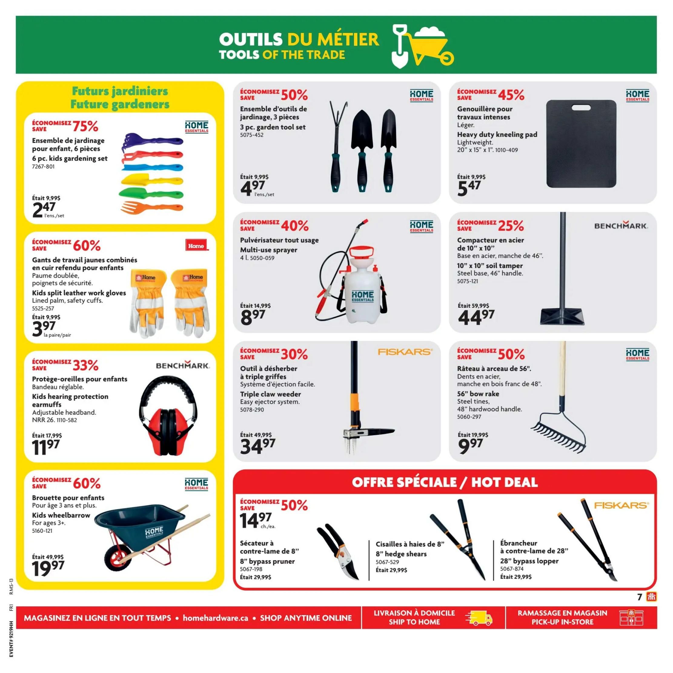 Home Hardware flyer page 8 features 'Tools of the Trade'. Savings include 75% off a 6 pc. kids gardening set for $2.47, 60% off kids split leather work gloves for $3.97, and 33% off kids hearing protection earmuffs for $11.97. Also on sale is a 3 pc. garden tool set for $4.97 (50% off), a heavy duty kneeling pad for $5.47 (45% off), a multi-use sprayer for $8.97 (40% off), a 10' x 10' soil tamper for $44.97 (25% off), and a 56' bow rake for $9.97 (50% off). A kids wheelbarrow is 60% off at $19.97. Hot deals include an 8' bypass pruner for $14.97, 8' hedge shears for $9.97, and a 28' bypass lopper for $29.99.