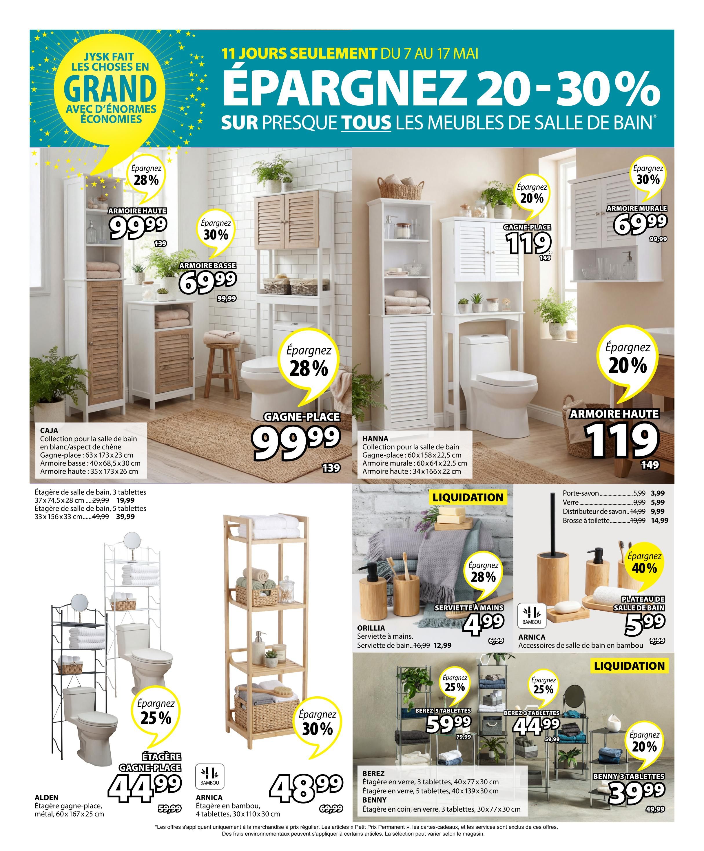 Jysk flyer page 29 features savings of 20-30% on bathroom furniture. Featured items include the CAJA collection with a tall cabinet for $99.99 (save 28%), a base cabinet for $69.99 (save 30%), and wall cabinets starting at $99.99. The HANNA collection offers a space-saver unit for $119 (save 20%) and a wall cabinet for $69.99 (save 30%). Also available are bathroom shelving units: the ALDEN metal shelving unit for $44.99 (save 25%), and the ARNICA bamboo shelving unit for $48.99 (save 30%). Bathroom accessories on liquidation include hand towels for $4.99 (save 28%), a bath mat for $5.99, and various bathroom organizers and toothbrush holders. The BERZ collection includes a 5-shelf unit for $59.99 (save 25%) and a 3-shelf unit for $44.99 (save 25%). The BENNY 3-shelf unit is $39.99 (save 20%). Prices are valid from May 7 to May 17.