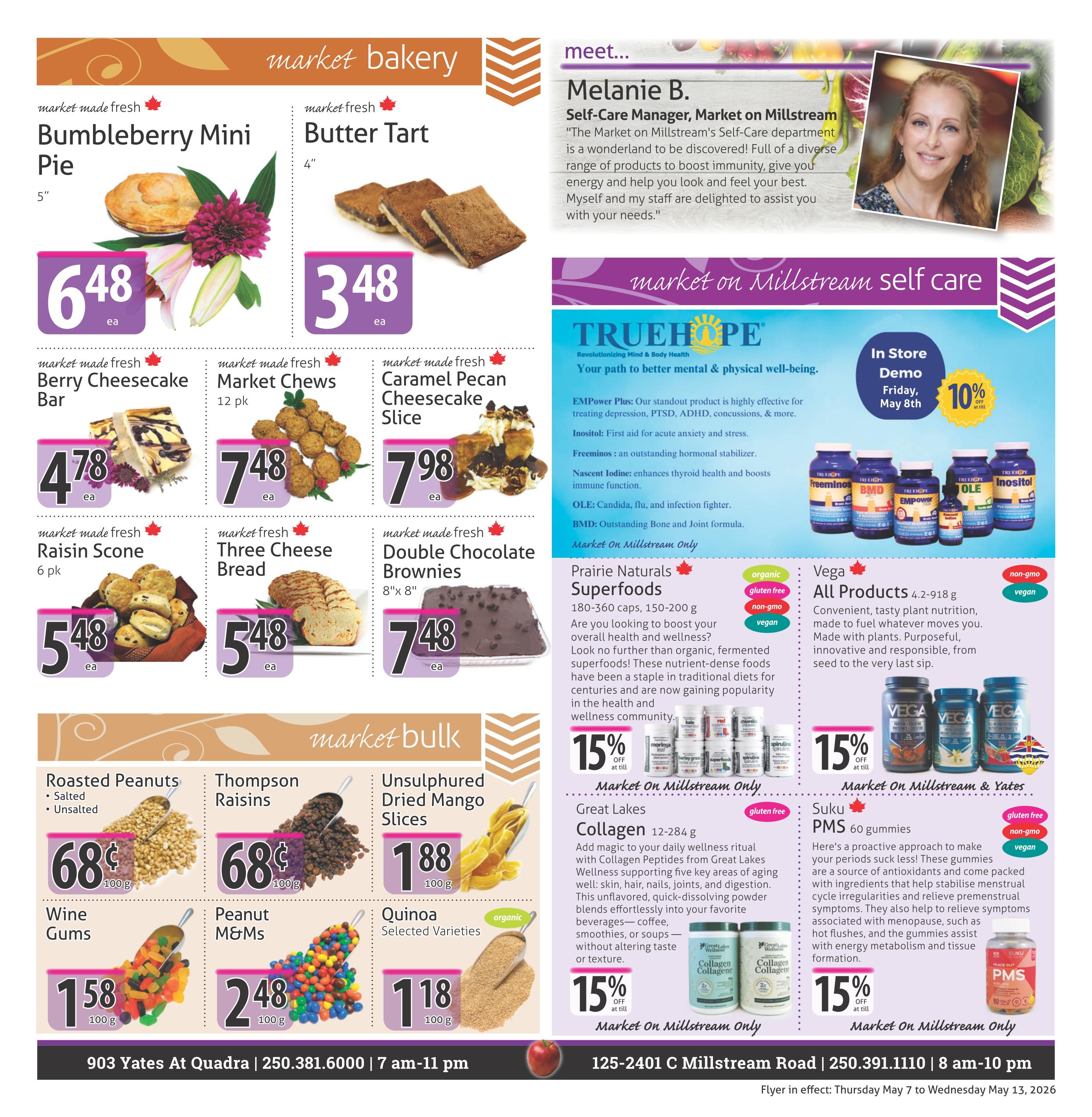 The Market Stores weekly flyer, page 7, features bakery items and market bulk specials. Bakery items include market made fresh Bumbleberry Mini Pie for $6.48 each, Butter Tart for $3.48 each, Berry Cheesecake Bar for $4.78 each, Market Chews 12 pk for $7.48 each, Caramel Pecan Cheesecake Slice for $7.98 each, Raisin Scone 6 pk for $5.48 each, Three Cheese Bread for $5.48 each, and Double Chocolate Brownies 8'x8' for $7.48 each. Market bulk specials include Roasted Peanuts (Salted & Unsalted) for 68¢ per 100g, Thompson Raisins for 68¢ per 100g, Unsulphured Dried Mango Slices for $1.88 per 100g, Wine Gums for $1.58 per 100g, Peanut M&Ms for $2.48 per 100g, and Quinoa Selected Varieties for $1.18 per 100g. The page also highlights 'Meet Melanie B.' from Market on Millstream's Self-Care department. A 'Truehope' section advertises their products like EMPower Plus, Inositol, Freeminors, Nascent Iodine, OLE, and BMD, with a '10% off' in-store demo on Friday, May 8th. Additionally, there are 'Market On Millstream Only' specials: Prairie Naturals Superfoods (180-360 caps, 150-200g) are 15% off, and Great Lakes Collagen (12-284g) is 15% off. 'Market On Millstream & Yates' offers Vega All Products (4.2-918g) with a 15% discount. Finally, 'Market On Millstream Only' features Suku PMS 60 gummies with a 15% discount. Store locations and hours are listed at the bottom: 903 Yates At Quadra (250.381.6000, 7 am-11 pm) and 125-2401 C Millstream Road (250.391.1110, 8 am-10 pm).