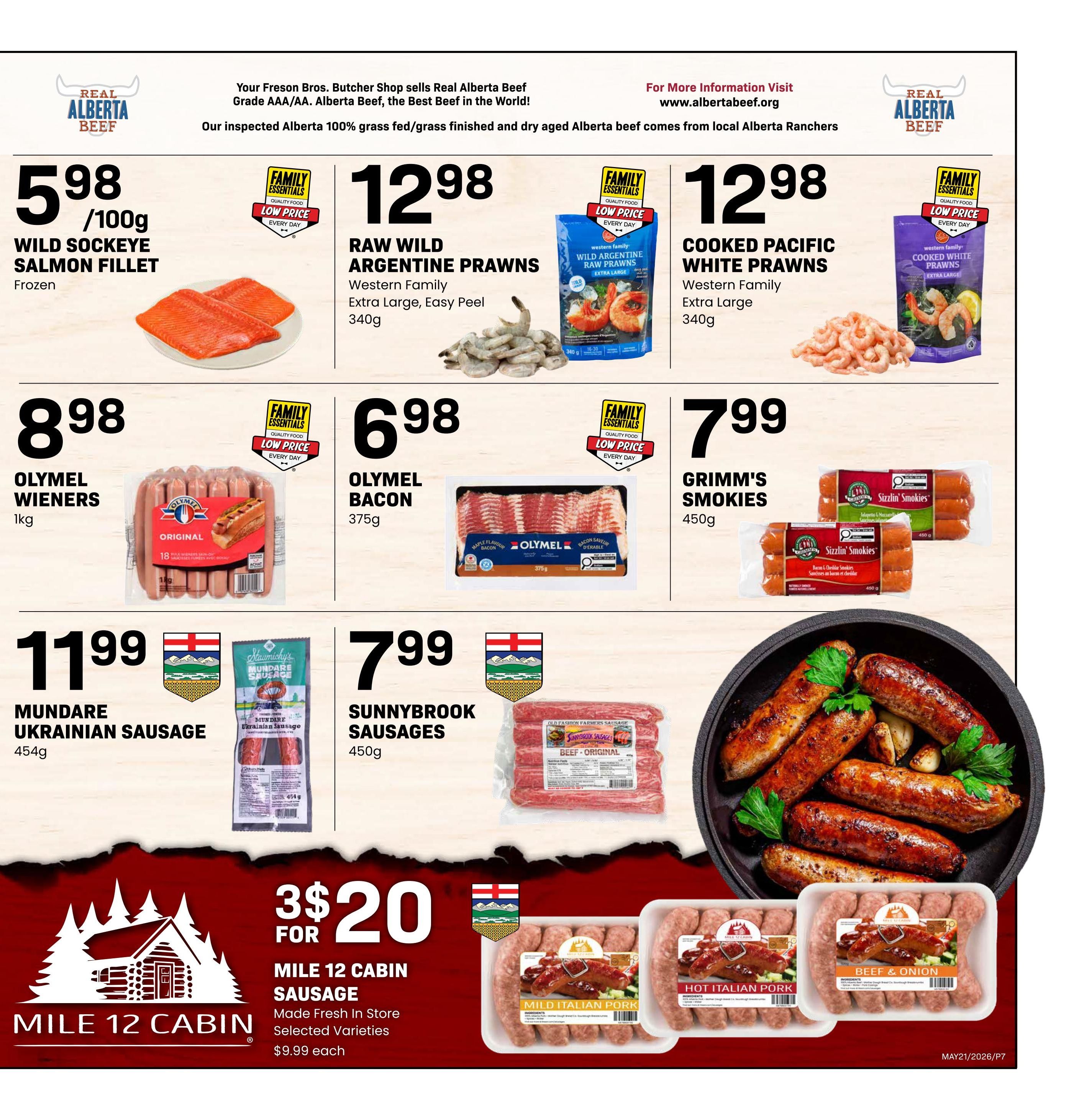 Freson Bros weekly flyer specials page 7 features a variety of meat and seafood products. Wild Sockeye Salmon Fillet is priced at $5.98 per 100g. Raw Wild Argentine Prawns (Western Family, Extra Large, Easy Peel, 340g) are $12.98. Cooked Pacific White Prawns (Western Family, Extra Large, 340g) are also $12.98. Olymel Wieners (Original, 1kg) are $8.98. Olymel Bacon (Maple Flavour, 375g) is $6.98. Grimm's Smokies (Sizzlin' Smokies, 450g) are $7.99. Mundare Ukrainian Sausage (454g) is $11.99. Sunnybrook Sausages (Beef Original, 450g) are $7.99. Mile 12 Cabin Sausage, made fresh in store in selected varieties, is 3 for $20, with individual packages priced at $9.99 each. Varieties include Mild Italian Pork, Hot Italian Pork, and Beef & Onion.