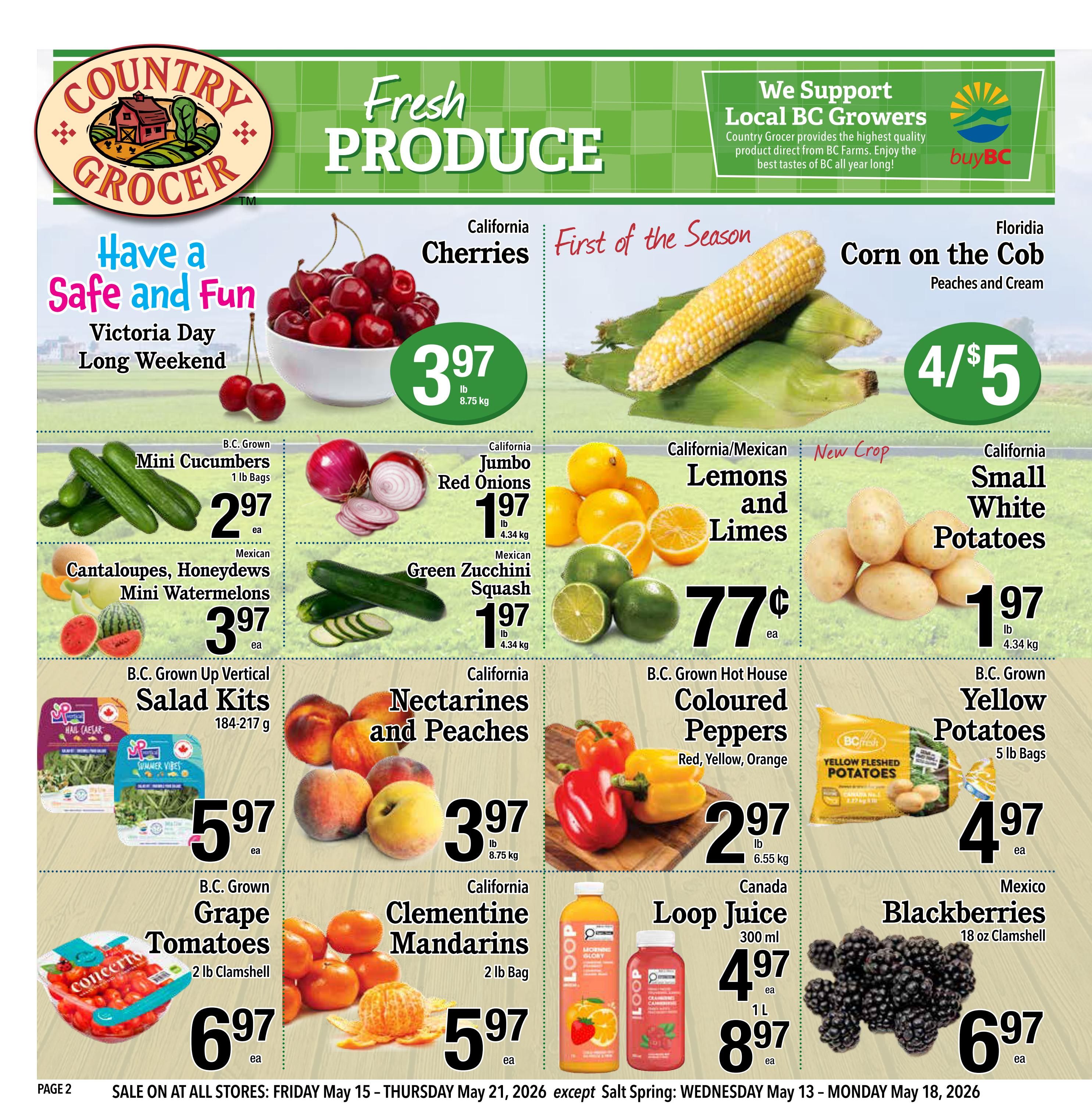 Country Grocer weekly flyer specials page 2 features fresh produce. California Cherries are $3.97/lb. Florida Corn on the Cob (Peaches and Cream) is 4 for $5. B.C. Grown Mini Cucumbers are $2.97 each. California Jumbo Red Onions are $1.97/lb. Mexican Cantaloupes, Honeydews, and Mini Watermelons are $3.97 each. Mexican Green Zucchini Squash is $1.97/lb. California/Mexican Lemons and Limes are 77 cents each. New Crop California Small White Potatoes are $1.97/lb. B.C. Grown Up Vertical Salad Kits (184-217g) are $5.97 each. California Nectarines and Peaches are $3.97/lb. B.C. Grown Hot House Coloured Peppers (Red, Yellow, Orange) are $2.97/lb. B.C. Grown Yellow Potatoes (5 lb bags) are $4.97 each. B.C. Grown Grape Tomatoes (2 lb clamshell) are $6.97 each. California Clementine Mandarins (2 lb bag) are $5.97 each. Canada Loop Juice (300ml) is $4.97 each and (1L) is $8.97 each. Mexico Blackberries (18 oz clamshell) are $6.97 each. Sale is valid Friday May 15 - Thursday May 21, 2026.