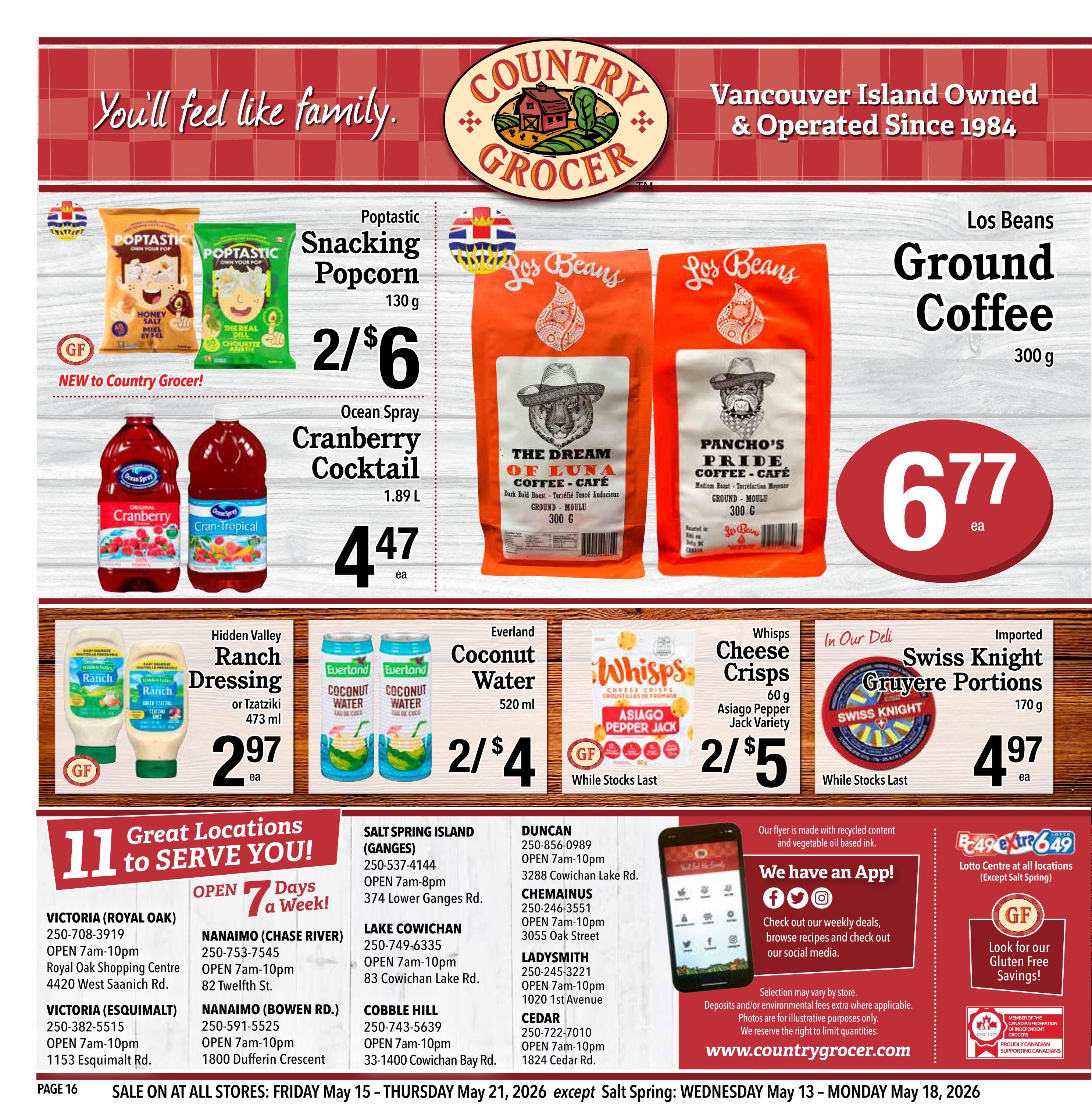 Country Grocer weekly flyer specials, page 16. Featured products include Poptastic Snacking Popcorn 130g at 2 for $6, Ocean Spray Cranberry Cocktail 1.89 L at $4.47 each, Los Beans Ground Coffee 300g at $6.77 each, Hidden Valley Ranch Dressing or Tzatziki 473 ml at $2.97 each, Everland Coconut Water 520 ml at 2 for $4, Whisps Cheese Crisps Asiago Pepper Jack Variety 60g at 2 for $5, and Imported Swiss Knight Gruyere Portions 170g at $4.97 each. The flyer also lists 11 Country Grocer locations with addresses and phone numbers, including Victoria (Royal Oak), Victoria (Esquimalt), Nanaimo (Chase River), Nanaimo (Bowen Rd.), Salt Spring Island (Ganges), Duncan, Chemainus, Ladysmith, and Cedar. The sale runs from Wednesday, May 13 to Monday, May 18, 2026, except for Salt Spring Island which is valid from May 14 to May 18, 2026. Information about the Country Grocer app, Lotto Centre, and gluten-free savings is also included. The flyer is made with recycled content and vegetable oil-based ink.