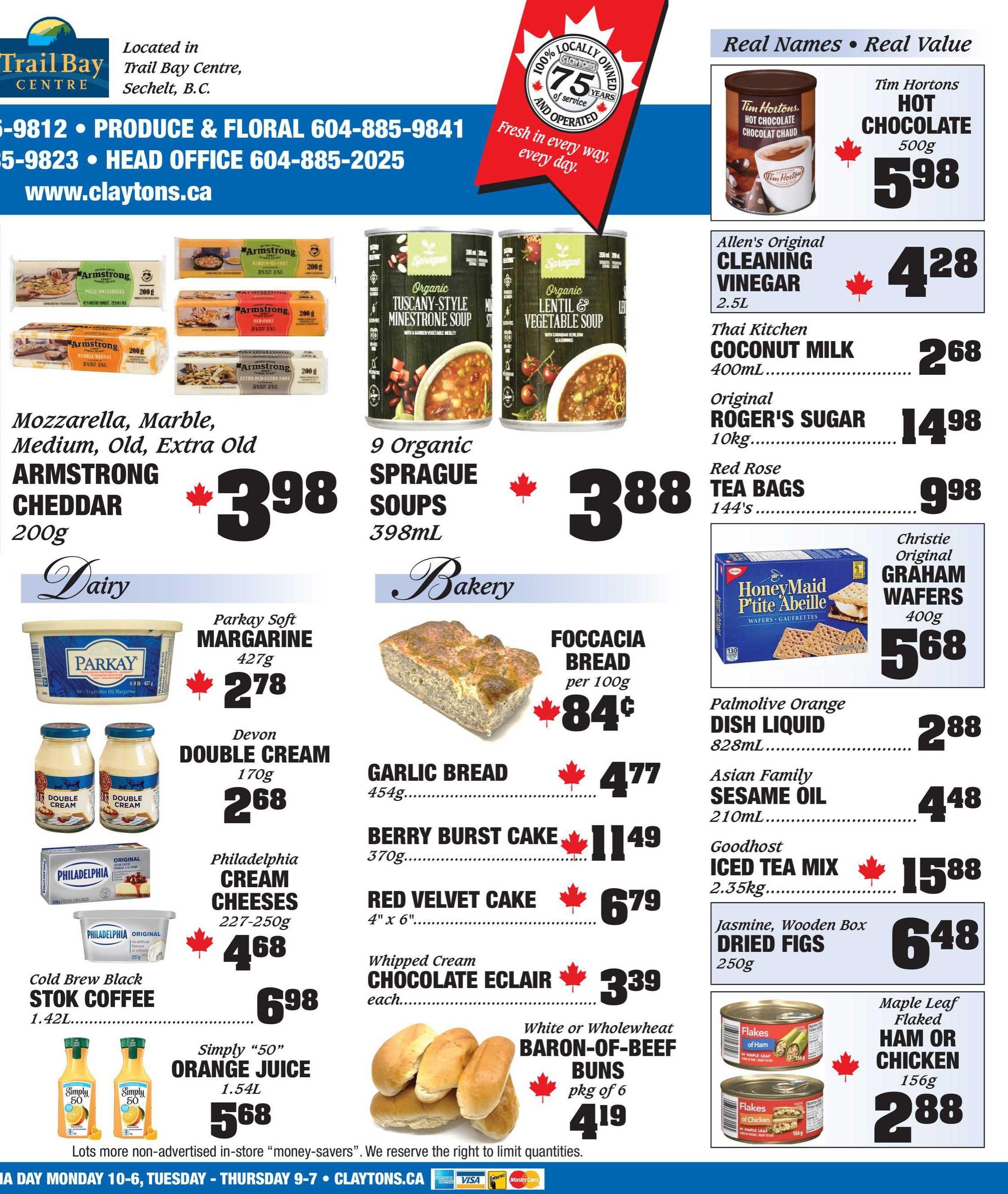 Claytons Heritage Market weekly flyer specials page 3. Featured items include: Mozzarella, Marble, Medium, Old, Extra Old Armstrong Cheddar 200g for $3.98; Parkay Soft Margarine 427g for $2.78; Devon Double Cream 170g for $2.68; Philadelphia Cream Cheeses 227-250g for $4.68; Cold Brew Black Stok Coffee 1.42L for $6.98; Simply '50' Orange Juice 1.54L for $5.68. Bakery items: Focaccia Bread per 100g for $0.84; Garlic Bread 454g for $4.77; Berry Burst Cake 370g for $11.49; Red Velvet Cake 4' x 6' for $6.79; Whipped Cream Chocolate Eclair each for $3.39; White or Wholewheat Baron-of-Beef Buns pkg of 6 for $4.19. Also featured are: 9 Organic Sprague Soups 398mL for $3.88; Tim Hortons Hot Chocolate 500g for $5.98; Allen's Original Cleaning Vinegar 2.5L for $4.28; Thai Kitchen Coconut Milk 400mL for $2.68; Original Roger's Sugar 10kg for $14.98; Red Rose Tea Bags 144's for $9.98; Christie Original Graham Wafers 400g for $5.68; Palmolive Orange Dish Liquid 828mL for $2.88; Asian Family Sesame Oil 210mL for $4.48; Goodhost Iced Tea Mix 2.35kg for $15.88; Jasmine, Wooden Box Dried Figs 250g for $6.48; and Maple Leaf Flaked Ham or Chicken 156g for $2.88.