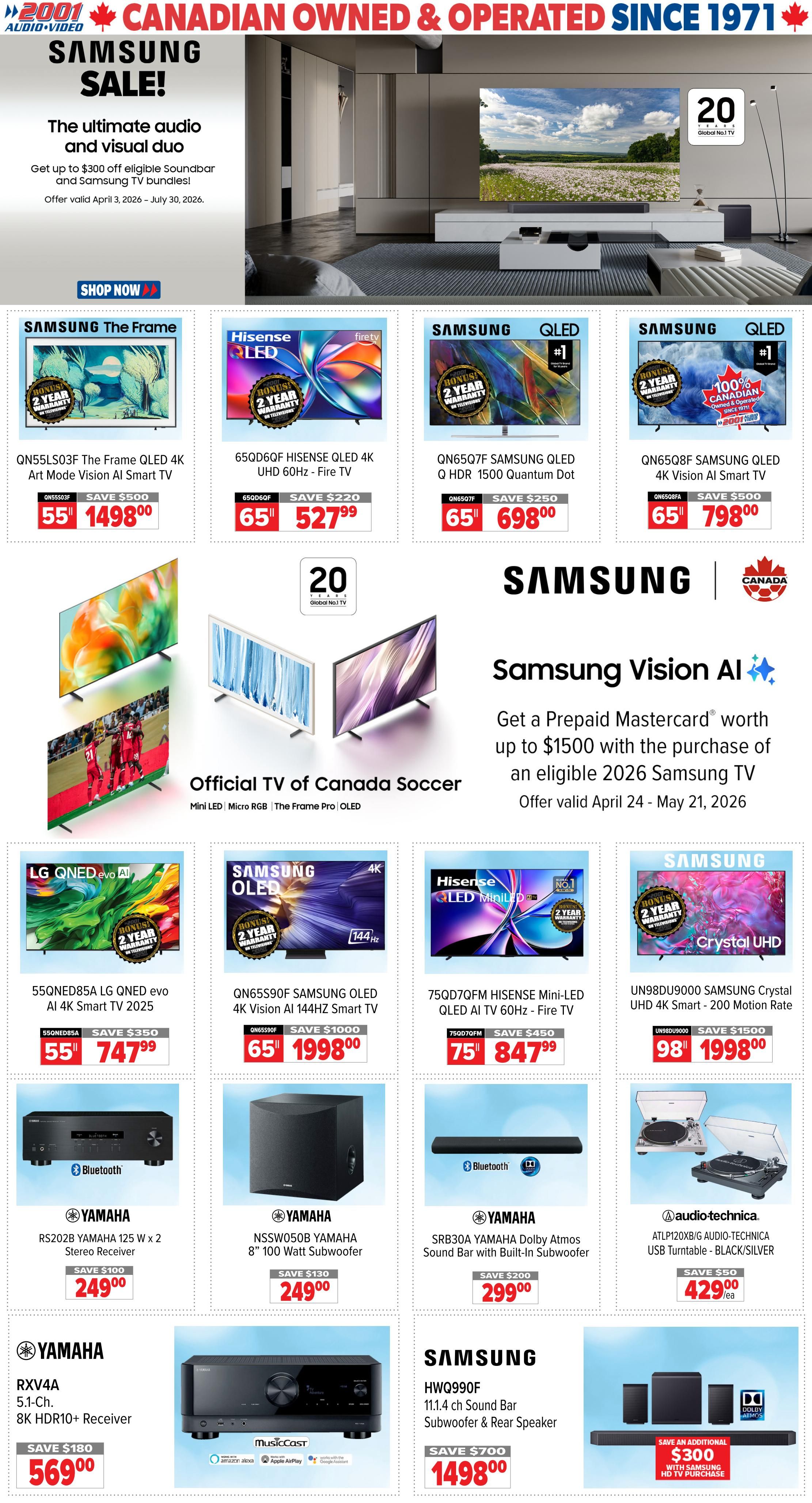 2001 Audio Video flyer page 1 featuring a Samsung Sale with offers valid April 3, 2026 - July 30, 2026. Featured TVs include the Samsung The Frame QLED 4K Art Mode Vision AI Smart TV QN55LS03F for $1498.00 (save $500), Hisense QLED 4K UHD 60Hz - Fire TV 65Q6D60F for $527.99 (save $220), Samsung QLED Q HDR 1500 Quantum Dot QN65Q7F for $698.00 (save $250), and Samsung QLED 4K Vision AI Smart TV QN65Q8FA for $798.00 (save $500). Also shown are the LG QNED evo AI 4K Smart TV 55QNED85A for $747.99 (save $350), Samsung OLED 4K Vision AI 144Hz Smart TV QN65S90F for $1998.00 (save $1000), and Hisense Mini-LED QLED AI TV 60Hz - Fire TV 75QD7QFM for $847.99 (save $450). The Samsung Crystal UHD 4K Smart - 200 Motion Rate UN98DU9000 is $1998.00 (save $1500). A special offer provides a Prepaid Mastercard worth up to $1500 with the purchase of an eligible 2026 Samsung TV, valid April 24 - May 21, 2026. Audio products include the Yamaha RS202B Yamaha 125 W x 2 Stereo Receiver for $249.00 (save $100), Yamaha NSSW050B Yamaha 8' 100 Watt Subwoofer for $249.00 (save $130), Yamaha SRB30A Yamaha Dolby Atmos Sound Bar with Built-in Subwoofer for $299.00 (save $200), Audio-Technica ATLP120XBG AUDIO-TECHNICA USB Turntable - BLACK/SILVER for $429.00 (save $50), Yamaha RXV4A 5.1-Ch. 8K HDR10+ Receiver for $569.00 (save $180), and Samsung HWQ990F 11.1.4 ch Sound Bar Subwoofer & Rear Speaker for $1498.00 (save $700). An additional $300 savings is available with Samsung HD TV purchase.