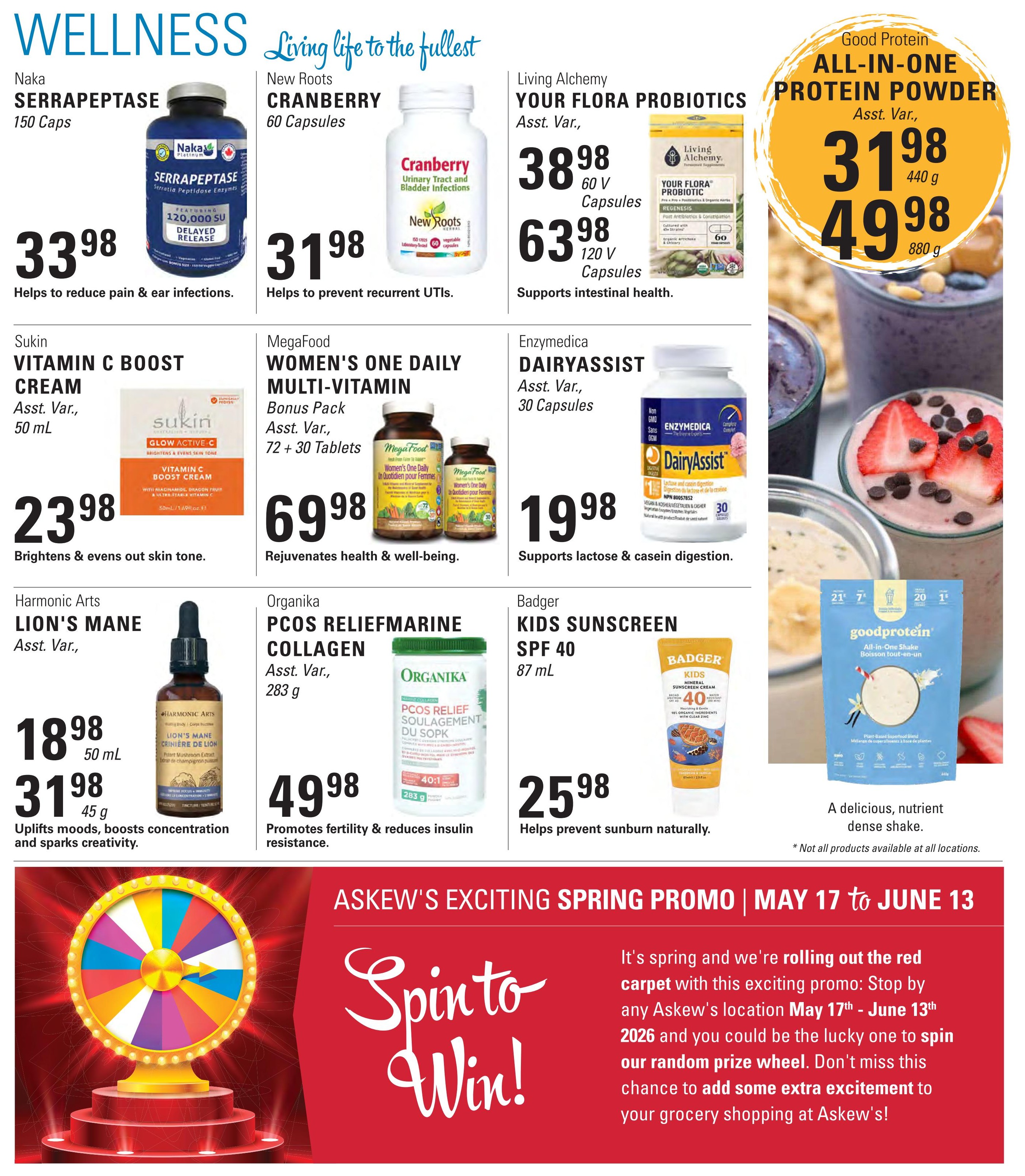 Askew's Foods Wellness page featuring health and beauty products. Naka Serrapeptase 150 Caps for $33.98, New Roots Cranberry 60 Capsules for $31.98, Living Alchemy Your Flora Probiotics 60 V Capsules for $38.98 and 120 V Capsules for $63.98. Sukin Vitamin C Boost Cream 50 mL for $23.98. MegaFood Women's One Daily Multi-Vitamin Bonus Pack 72 + 30 Tablets for $69.98. Enzymedica DairyAssist 30 Capsules for $19.98. Harmonic Arts Lion's Mane 50 mL for $18.98 and 45 g for $31.98. Organika PCOS Reliefmarine Collagen 283 g for $49.98. Badger Kids Sunscreen SPF 40 87 mL for $25.98. Also featured is Good Protein All-In-One Protein Powder in 440 g for $31.98 and 880 g for $49.98. The page also advertises Askew's Exciting Spring Promo from May 17 to June 13, 2026, with a 'Spin to Win' random prize wheel event.