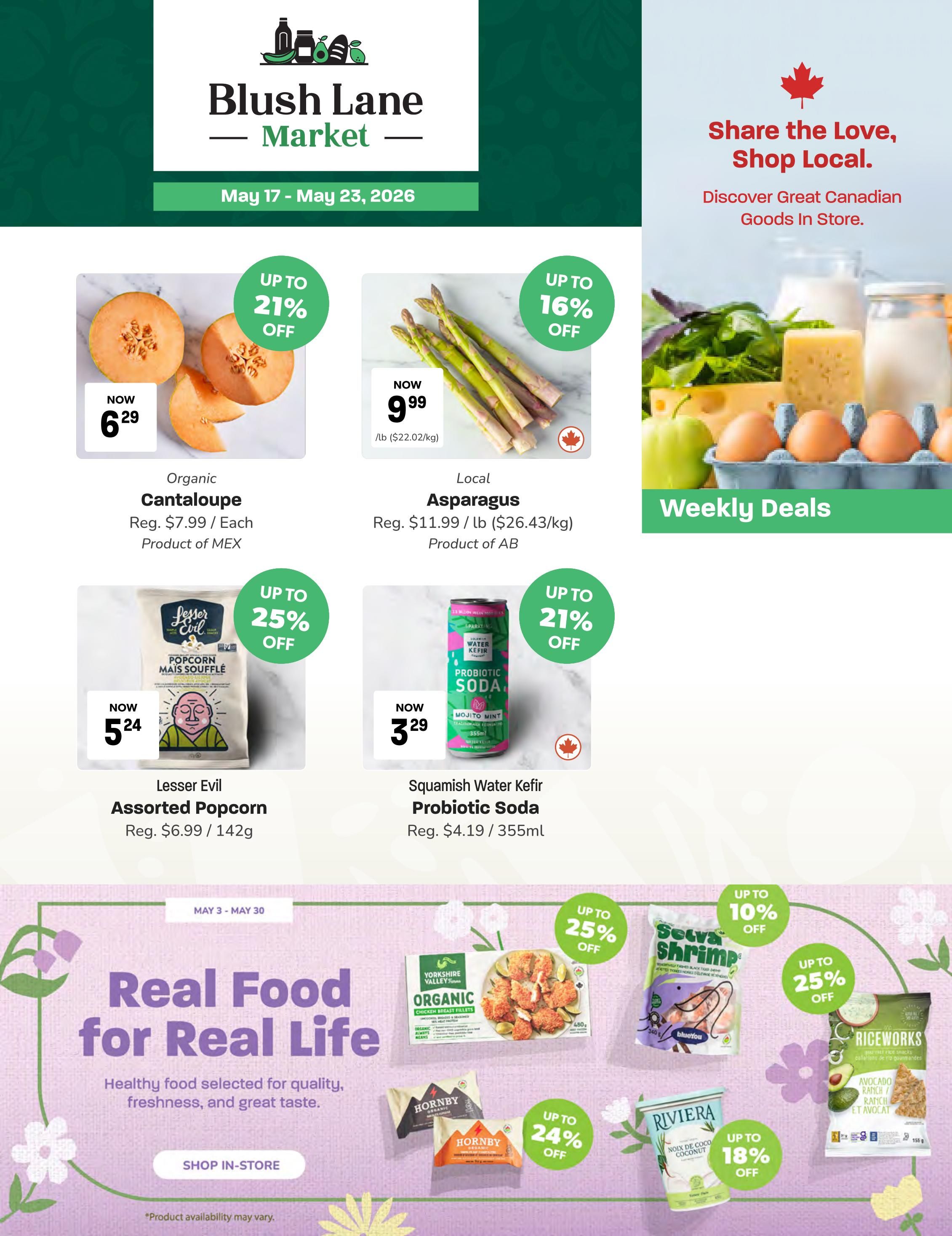 Blush Lane Organic Market weekly flyer specials from May 17 to May 23, 2026. Featured items include Organic Cantaloupe now $6.29, originally $7.99 each, with up to 21% off. Local Asparagus is now $9.99/lb, originally $11.99/lb, with up to 16% off. Lesser Evil Assorted Popcorn is now $5.24, originally $6.99/142g, with up to 25% off. Squamish Water Kefir Probiotic Soda is now $3.29, originally $4.19/355ml, with up to 21% off. The flyer also highlights 'Real Food for Real Life' with various products including Yorkshire Valley Organic Chicken Breast Fillets, Hornby products, Selva Shrimp, Riceworks snacks, and Riviera Coconut water, with discounts up to 25% off.