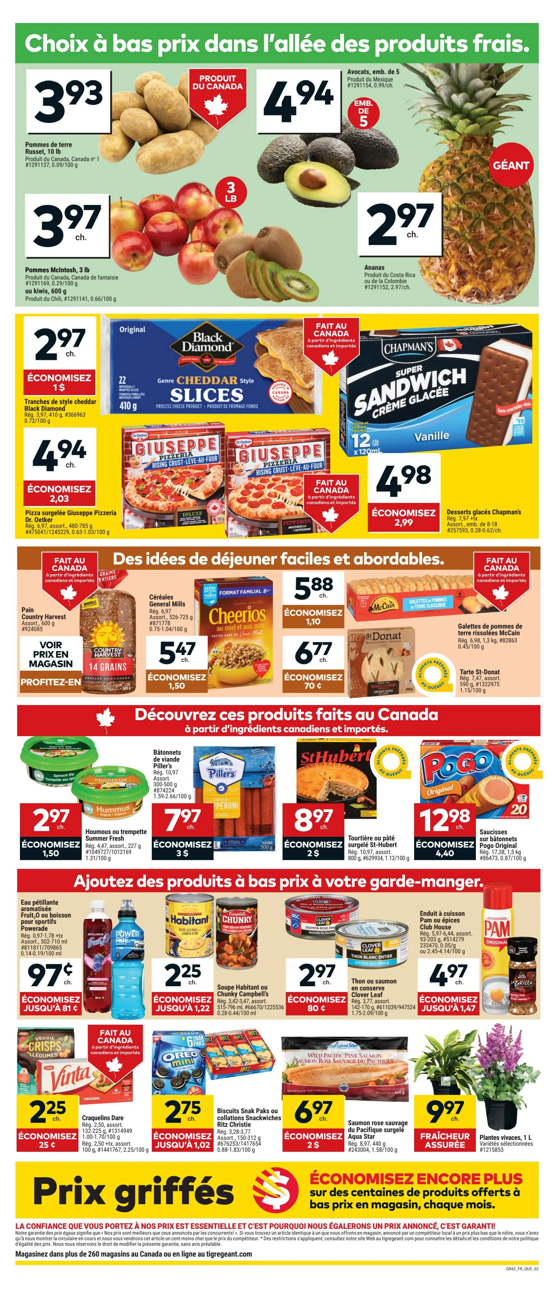 Giant Tiger weekly flyer specials for Quebec, page 2. Fresh produce includes Russet potatoes for $3.93, 3 lb McIntosh apples for $3.97, 5 avocados for $4.94, and a giant pineapple for $2.97. Other fresh items include Black Diamond Cheddar Style Slices for $2.97, saving $1, and two Giuseppe Pizzeria frozen pizzas for $4.94, saving $2.03. Breakfast ideas feature Country Harvest 14 Grains bread, Cheerios cereal for $5.88, saving $1.10, and McCain Classic Home Fries for $6.77, saving $0.70. Also available are St-Donat Tartelettes for $4.98. Discover more Canadian-made products like Piller's Pepperoni sticks for $7.97, saving $3, and St-Hubert tourtière or pâté for $8.97, saving $2. For beverages, find Powerade drinks for $0.97, saving $0.81. Other items include Habitant or Chunky Campbell's soup for $2.25, saving $1.22, and Clover Leaf tuna for $2.97, saving $0.80. Also featured are PAM cooking spray for $4.97, saving $1.47, Vinta Veggie Crisps for $2.25, saving $0.25, Oreo Mini Snack Paks for $2.75, saving $1.02, and Aqua Star Pacific Pink Salmon for $6.97, saving $2. Finally, potted plants are available for $9.97. The flyer highlights 'Prix griffés' (marked prices) and 'Économisez encore plus' (save even more) on hundreds of products.