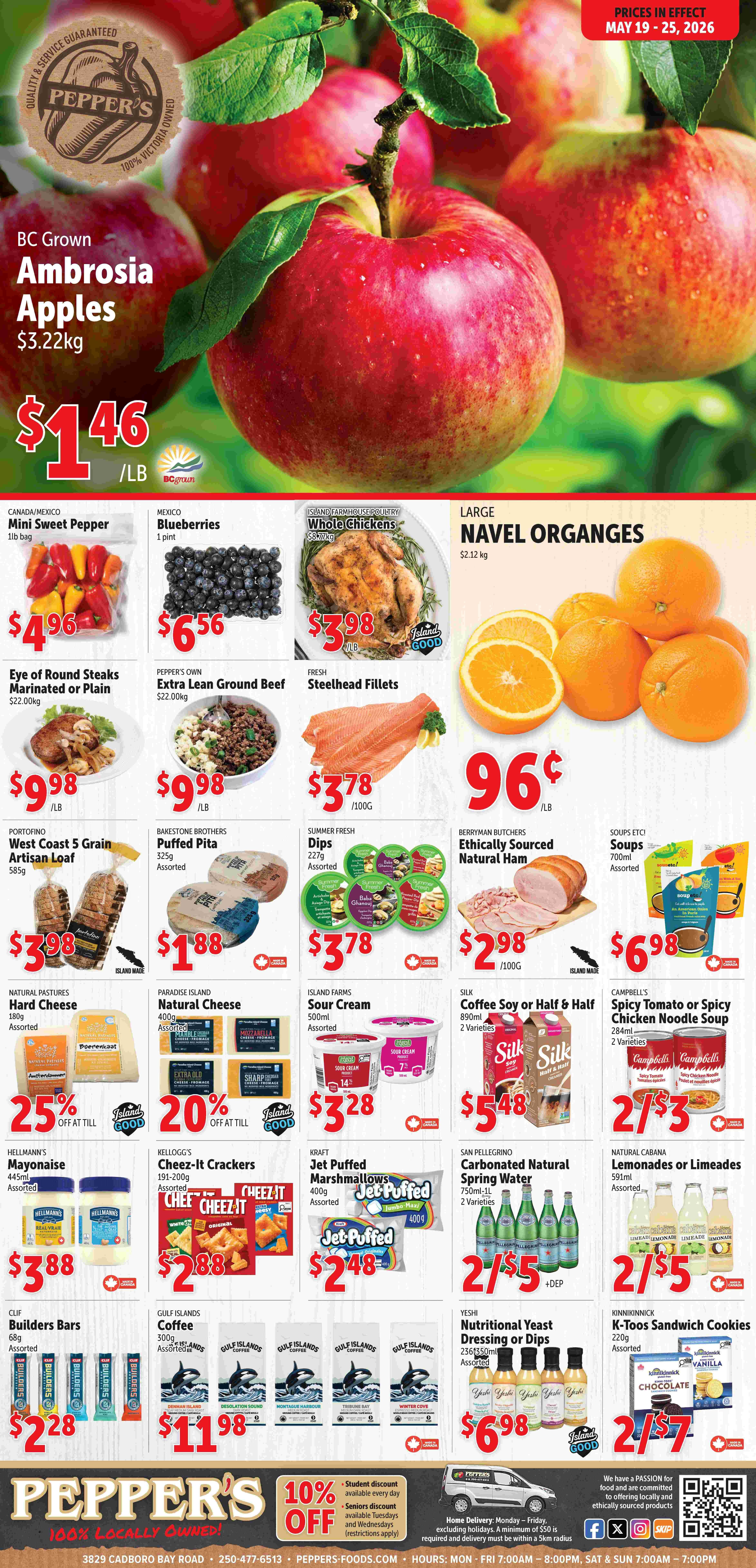 Pepper's flyer, with prices in effect May 19 - 25, 2026. The top banner highlights 'Quality & Service Guaranteed, Pepper's, 100% Victoria Owned'. The main feature is BC Grown Ambrosia Apples for $1.46/lb, originally $3.22/kg. Below, Mini Sweet Pepper (1lb bag) is $4.96. Blueberries (1 pint) are $6.56. Island Farmhouse Poultry Whole Chickens ($8.77/kg) are $3.98/lb. Large Navel Oranges ($2.12/kg) are $0.96/lb. Pepper's Own Eye of Round Steaks, marinated or plain ($22.00/kg), are $9.98/lb. Pepper's Own Extra Lean Ground Beef ($22.00/kg) is $9.98/lb. Fresh Steelhead Fillets are $3.78/100g. Berryman Butchers Ethically Sourced Natural Ham is $2.98/100g. Portofino West Coast 5 Grain Artisan Loaf (585g) is $3.98. Bakestone Brothers Puffed Pita (325g, assorted) is $1.88. Summer Fresh Dips (227g, assorted) are $3.78. Soups Etc! Soups (700ml, assorted) are $6.98. Natural Pastures Hard Cheese (180g, assorted) is 25% off. Paradise Island Natural Cheese (400g, assorted) is 20% off. Island Farms Sour Cream (500ml, assorted) is $3.28. Silk Coffee Soy or Half & Half (890ml, 2 varieties) is $5.48. Campbell's Spicy Tomato or Spicy Chicken Noodle Soup (284ml, 2 varieties) are 2 for $3. Hellmann's Mayonnaise (445ml, assorted) is $3.88. Kellogg's Cheez-It Crackers (191-200g, assorted) are $2.88. Kraft Jet Puffed Marshmallows (400g, assorted) are $2.48. San Pellegrino Carbonated Natural Spring Water (750ml-1L, 2 varieties) are 2 for $5 plus deposit. Natural Cabana Lemonades or Limeades (591ml, assorted) are 2 for $5. Clif Builders Bars (68g, assorted) are $2.28. Gulf Islands Coffee (300g, assorted) is $11.98. Yeshi Nutritional Yeast Dressing or Dips (236-350ml, assorted) are $6.98. Kinnikinnick K-Toos Sandwich Cookies (220g, assorted) are 2 for $7. The bottom of the flyer states 'Pepper's 100% Locally Owned!' and advertises a 10% off student discount daily, and a seniors discount on Tuesdays and Wednesdays. Home delivery is available Monday to Friday with a minimum $50 order within a 5km radius. Store contact information and hours are also provided.
