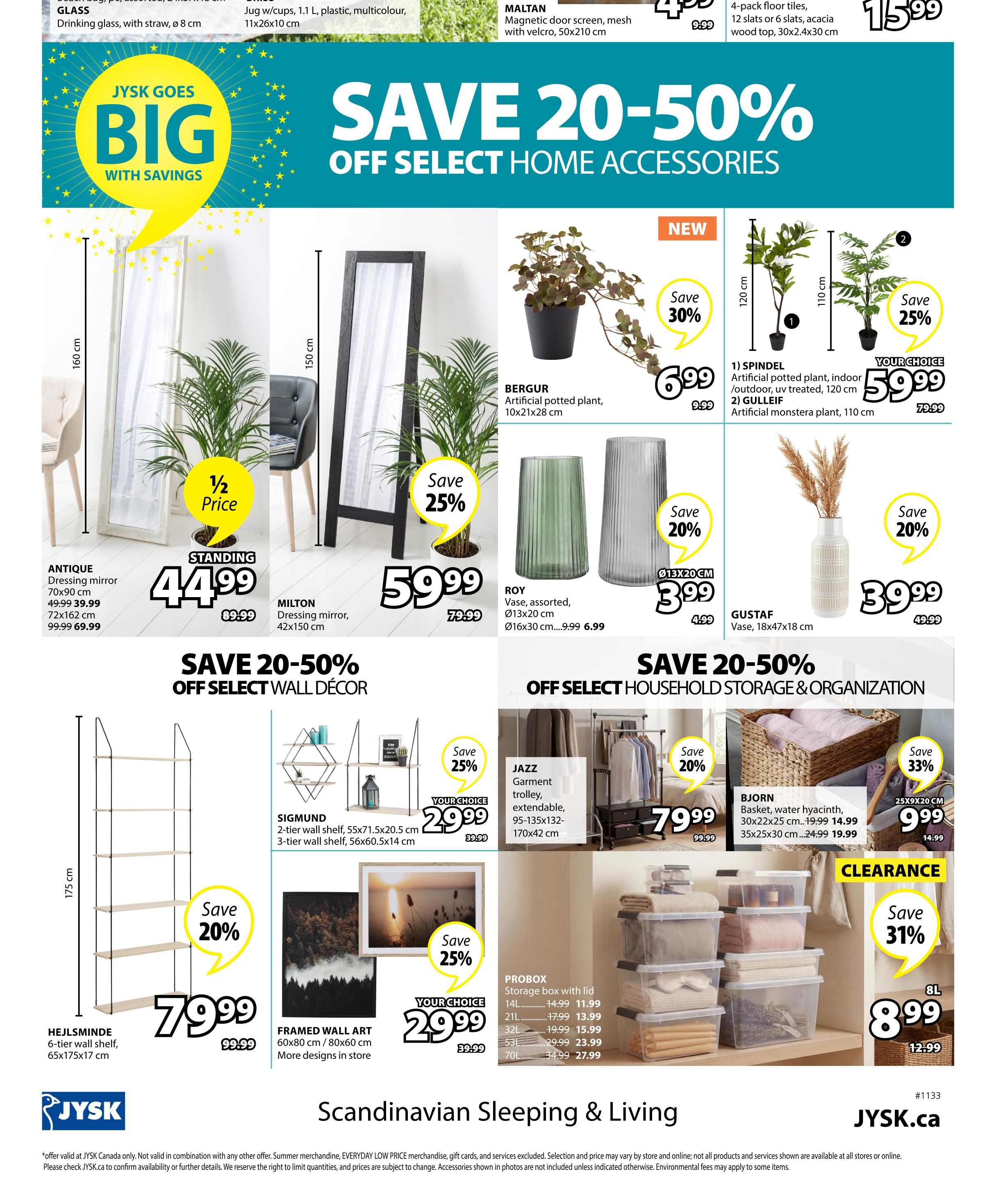 Jysk flyer page 18 featuring 'Save 20-50% Off Select Home Accessories'. Offers include: Antique standing dressing mirror, 70x90 cm, for $44.99 (was $99.99), with a 1/2 price offer. Milton dressing mirror, 42x150 cm, for $59.99 (was $79.99). Bergur artificial potted plant, 10x21x28 cm, on sale for $6.99 (was $9.99), save 30%. Spindel artificial potted plant, indoor/outdoor, uv treated, 120 cm, and Gulleif artificial monstera plant, 110 cm, your choice for $59.99 (was $79.99), save 25%. Roy vases, assorted, Ø13x20 cm, for $3.99 (was $4.99), save 20%. Gustaf vase, 18x47x18 cm, for $39.99 (was $49.99), save 20%. Also featured is 'Save 20-50% Off Select Wall Décor', including Sigmund 2-tier wall shelf, 55x71.5x20.5 cm, and 3-tier wall shelf, 56x60.5x14 cm, your choice for $29.99 (was $39.99), save 25%. Framed wall art, 60x80 cm / 80x60 cm, also your choice for $29.99 (was $39.99), save 25%. 'Save 20-50% Off Select Household Storage & Organization' includes: Hejlsminde 6-tier wall shelf, 65x175x17 cm, for $79.99 (was $99.99), save 20%. Jazz garment trolley, extendable, 95-135x132-170x42 cm, for $79.99 (was $99.99), save 20%. Probox storage boxes with lids in various sizes (14L, 21L, 32L, 53L, 70L) are on sale, starting from $11.99. Bjorn basket, water hyacinth, 30x22x25 cm for $14.99 and 35x25x30 cm for $19.99. Clearance item: 8L storage bin for $8.99 (was $12.99), save 31%.