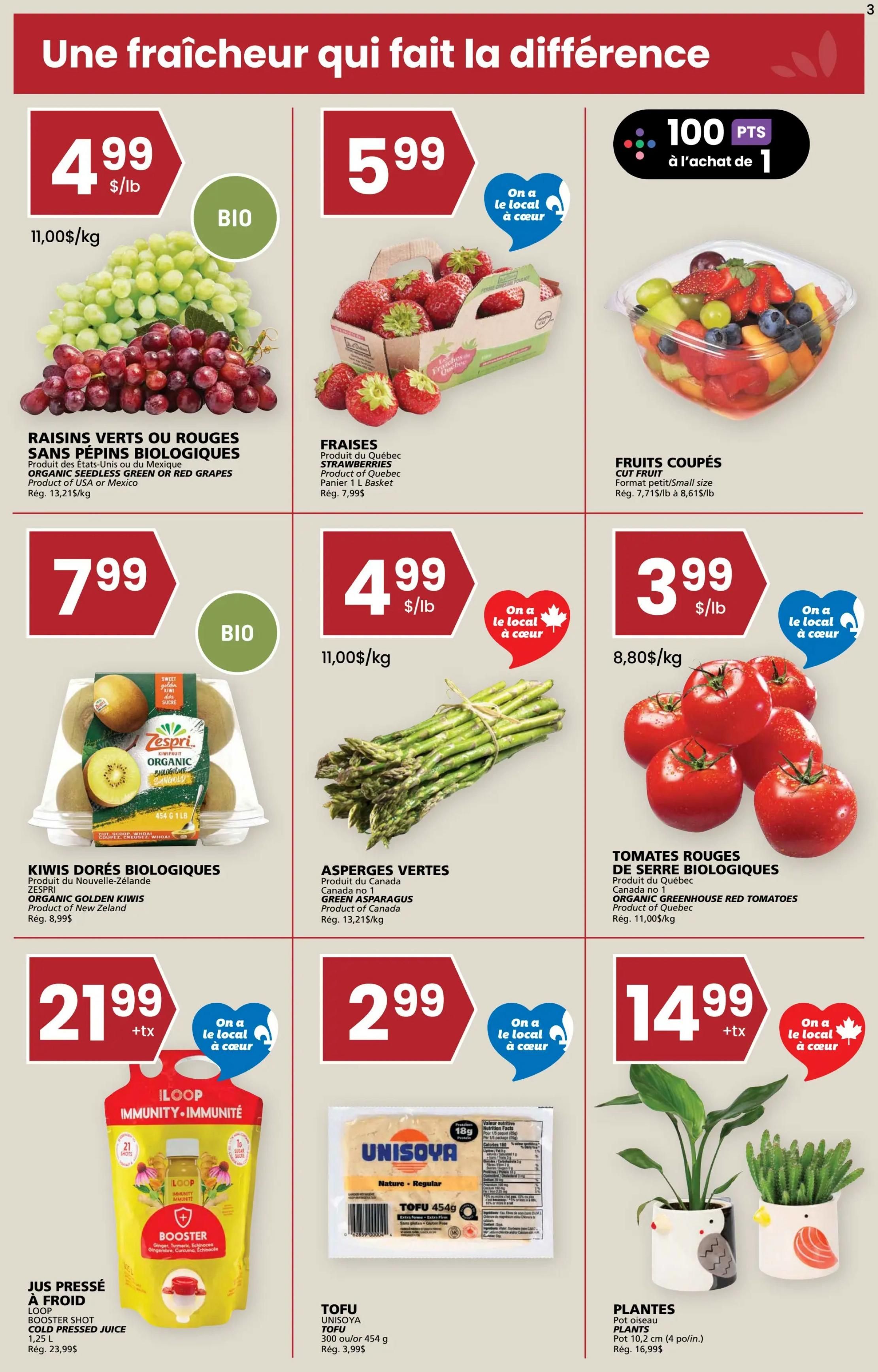 Rachelle Béry weekly flyer specials page 3 features a selection of fresh produce and other items. Organic seedless green or red grapes are $4.99/lb. Organic strawberries from Quebec are $5.99 per 1 L basket. Cut fruit in small size is available. Organic golden kiwis from New Zealand are $7.99 per package. Green asparagus from Canada is $4.99/lb. Organic greenhouse red tomatoes from Quebec are $3.99/lb. Loop Booster cold-pressed juice is $21.99 + tax. UnisoYa Tofu 454g is $2.99. Bird pot plants are $14.99 + tax. Some items feature 'On a le local à cœur' (We love local) and 'BIO' (Organic) labels.