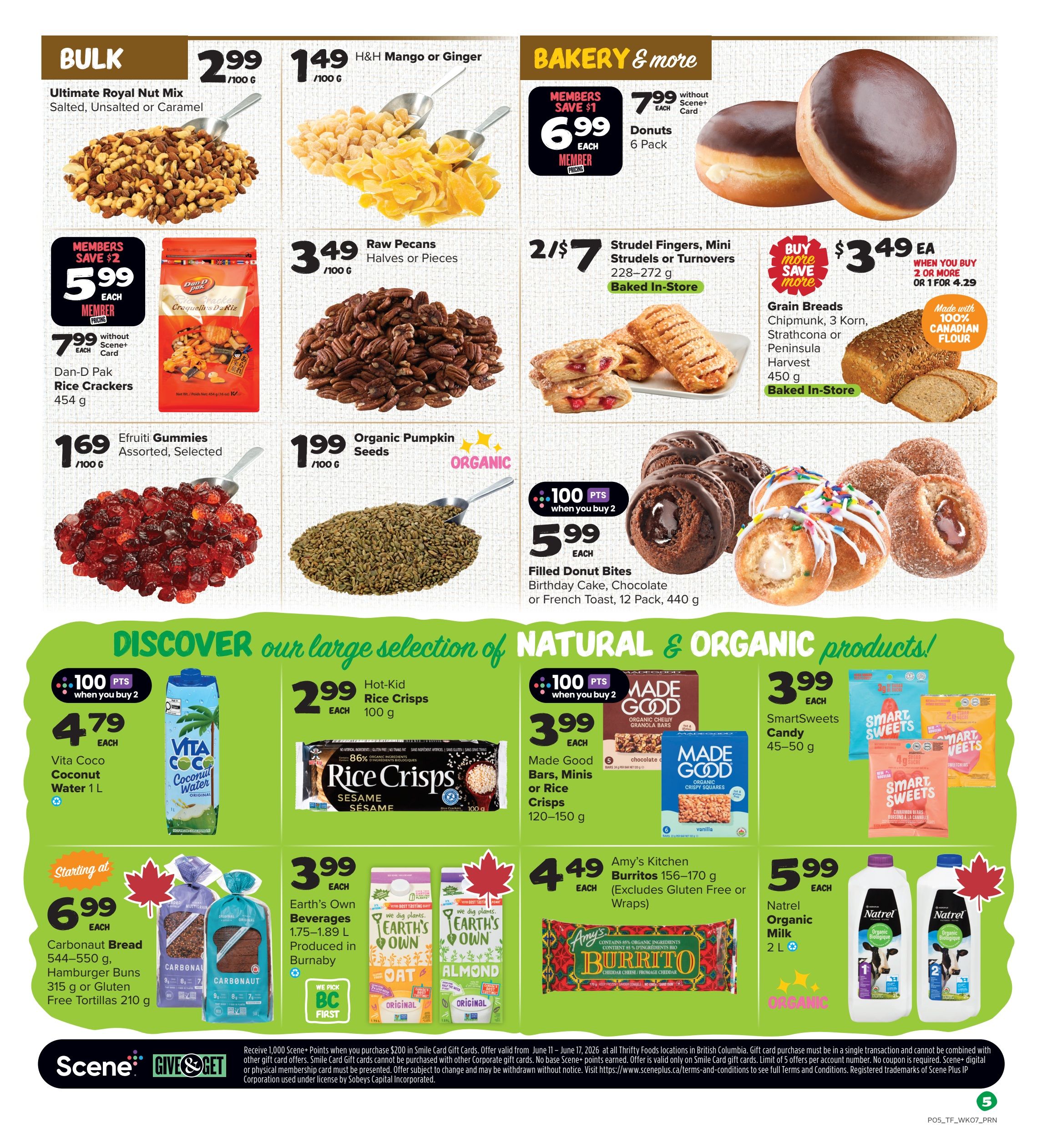 Thrifty Foods weekly flyer specials page 8. Bulk section features Ultimate Royal Nut Mix for $2.99/100g, H&H Mango or Ginger for $1.49/100g, Raw Pecans (Halves or Pieces) for $3.49/100g, Efruti Gummies for $1.69/100g, and Organic Pumpkin Seeds for $1.99/100g. Bakery & More includes Dan-D Pak Rice Crackers for $5.99 each (member price) or $7.99 without Scene+ card, Strudel Fingers, Mini Strudels or Turnovers for 2 for $7, and Filled Donut Bites (Birthday Cake, Chocolate, or French Toast) for $5.99 each (member price when you buy 2). Grain Breads (Chipmunk, 3 Korn, Strathcona or Peninsula Harvest) are $3.49 each when you buy 2 or more, or $4.29 for 1. Natural & Organic products include Vita Coco Coconut Water 1L for $4.79 each (100 bonus Scene+ points when you buy 2), Hot-Kid Rice Crisps for $2.99 each, Made Good Bars, Minis or Rice Crisps for $3.99 each (100 bonus Scene+ points when you buy 2), SmartSweets Candy 45-50g for $3.99 each, Carbonaut Bread (544-550g), Hamburger Buns (315g) or Gluten Free Tortillas (210g) starting at $6.99 each, Earth's Own Beverages 1.75-1.89L for $3.99 each, Amy's Kitchen Burritos 156-170g for $4.49 each, and Natrel Organic Milk 2L for $5.99 each. Scene+ points offer details are included at the bottom.