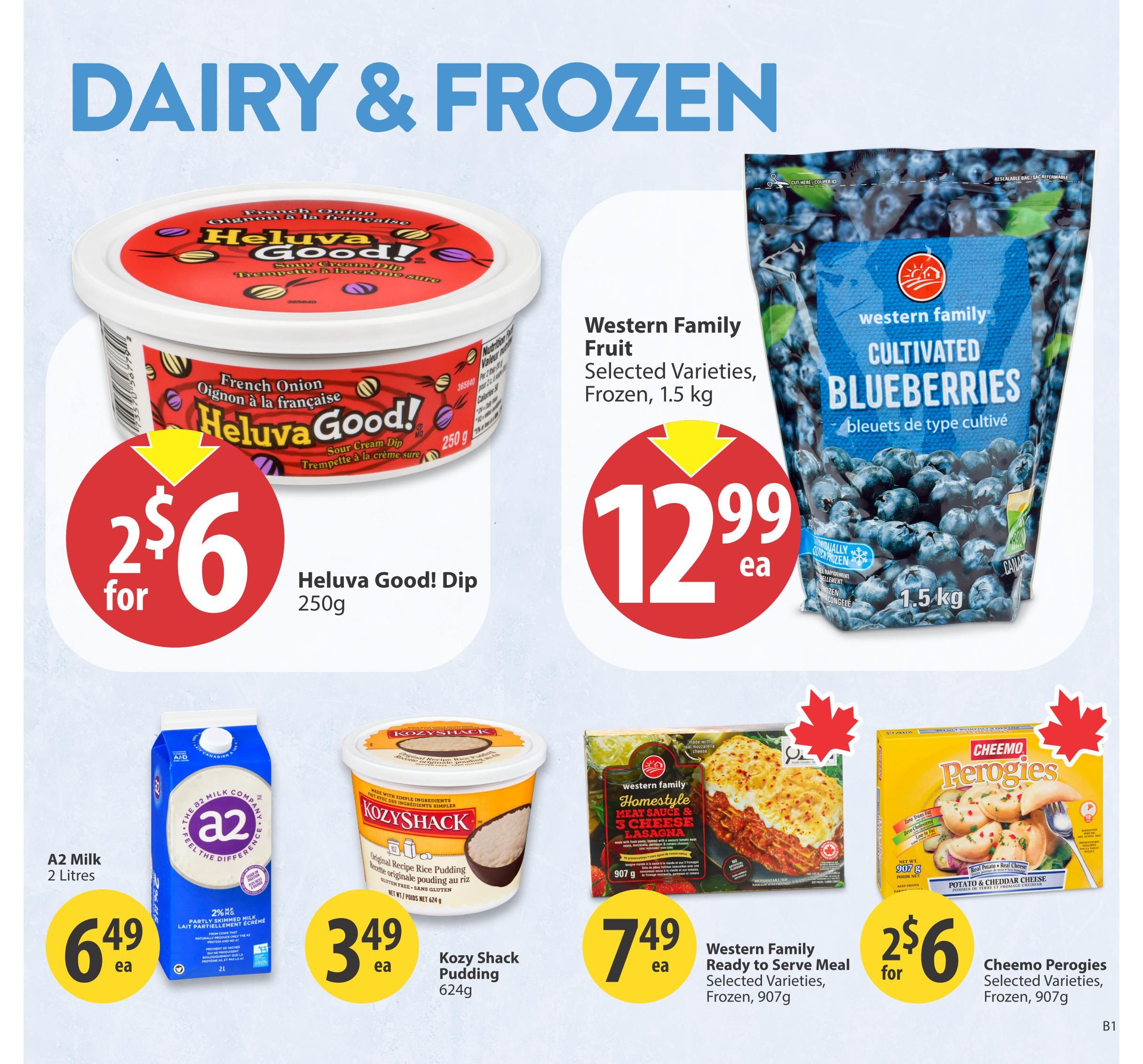 Save-On-Foods Alberta weekly flyer specials page 23 features dairy and frozen items. Highlights include Heluva Good! French Onion Dip 250g for 2 for $6, Western Family Cultivated Blueberries frozen 1.5 kg for $12.99 each, A2 Milk 2 Litres for $6.49 each, Kozy Shack Original Recipe Rice Pudding 624g for $3.49 each, Western Family Homestyle Meat Sauce & 3 Cheese Lasagna Ready to Serve Meal frozen 907g for $7.49 each, and Cheemo Perogies Potato & Cheddar Cheese frozen 907g for 2 for $6.