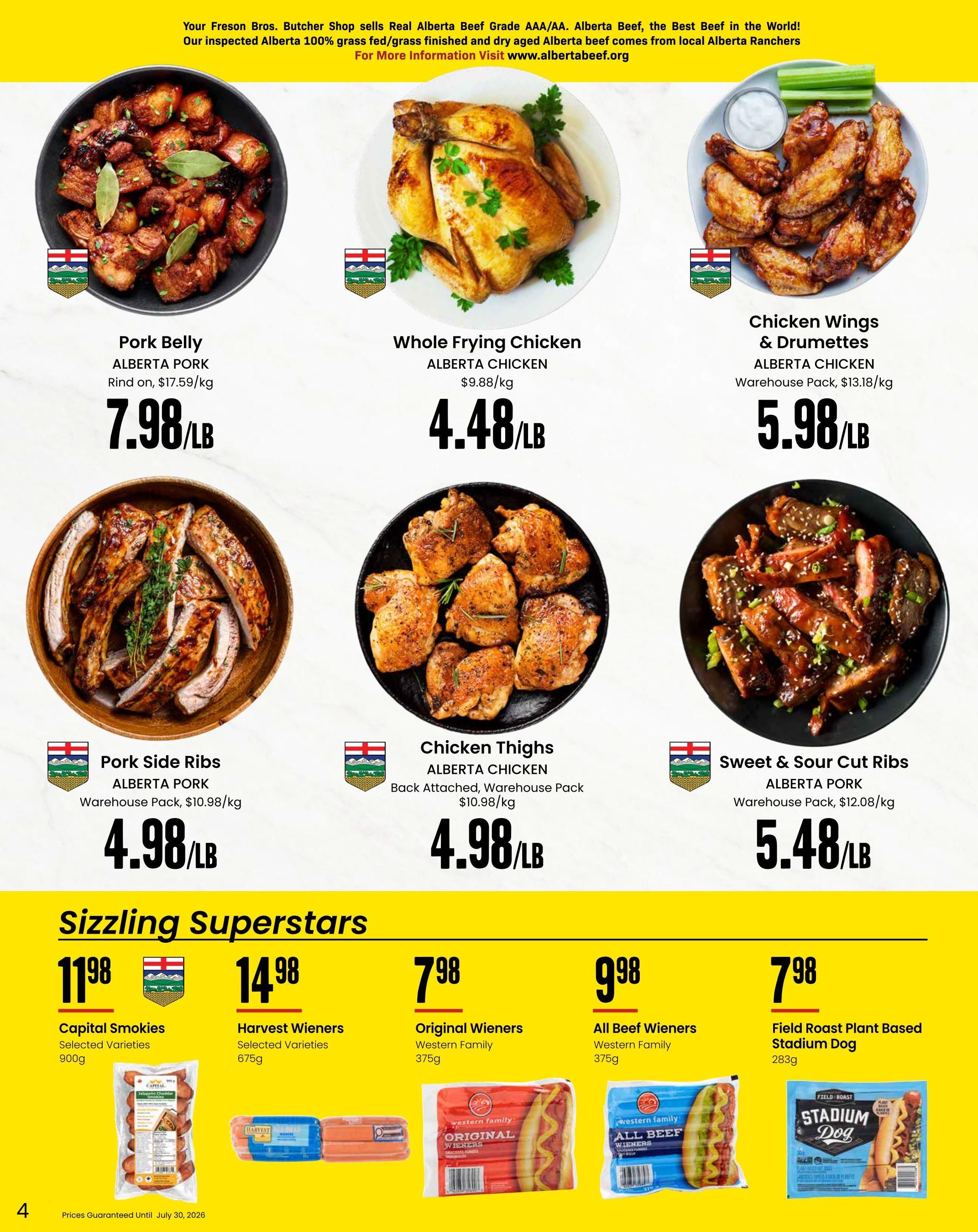 Freson Bros. flyer page 4 features Alberta Pork Belly at $7.98/LB, Whole Frying Chicken at $4.48/LB, Chicken Wings & Drumettes at $5.98/LB, Pork Side Ribs Warehouse Pack at $4.98/LB, Chicken Thighs Warehouse Pack at $4.98/LB, and Sweet & Sour Cut Ribs Warehouse Pack at $5.48/LB. The 'Sizzling Superstars' section includes Capital Smokies Selected Varieties 900g for $11.98, Harvest Wieners Selected Varieties 675g for $14.98, Original Wieners Western Family 375g for $7.98, All Beef Wieners Western Family 375g for $9.98, and Field Roast Plant Based Stadium Dog 283g for $7.98. Prices guaranteed until July 30, 2026.