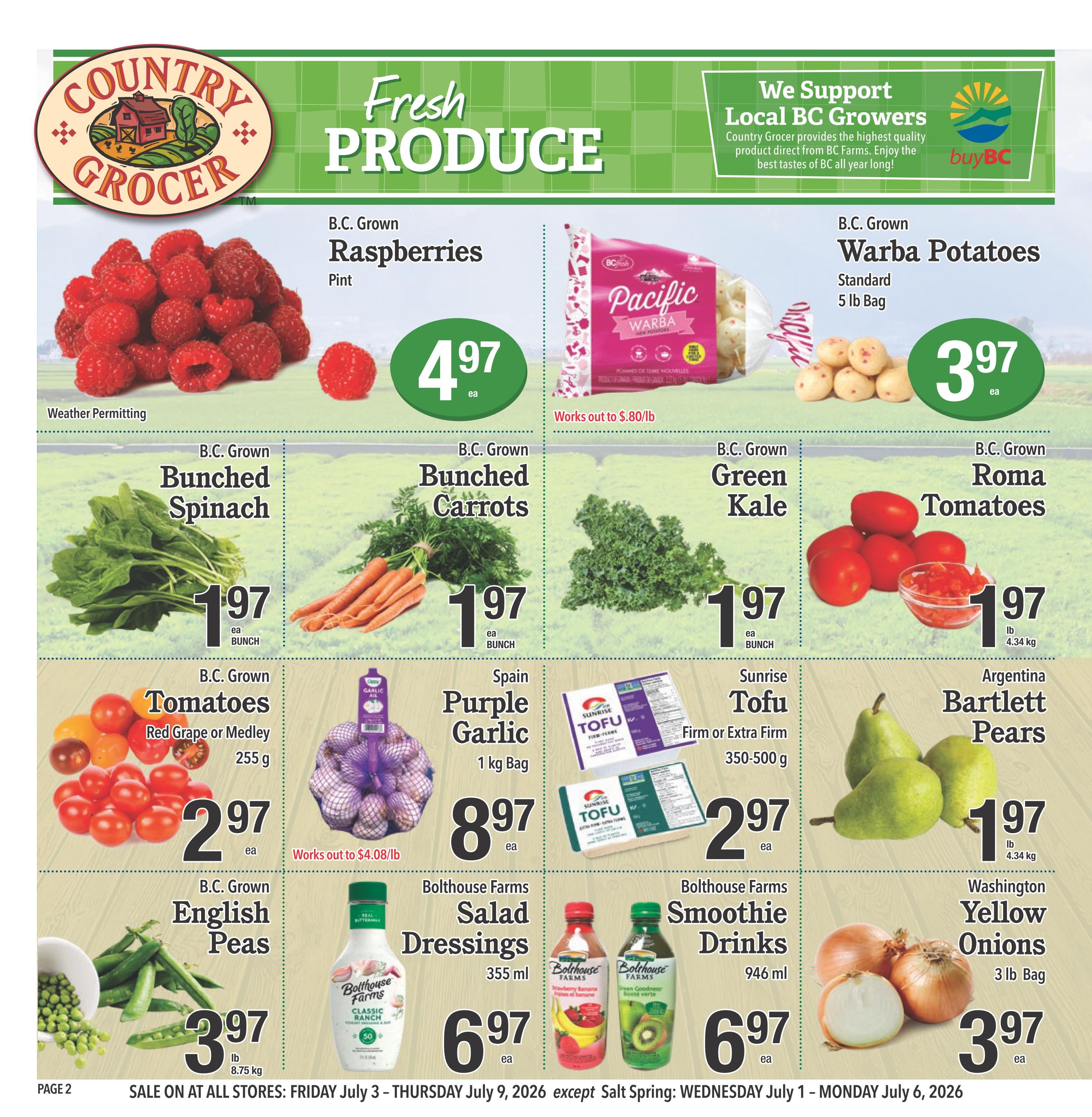 Country Grocer weekly flyer specials page 2 features fresh produce. B.C. Grown Raspberries are $4.97 per pint. Pacific Warba Potatoes, standard 5 lb bag, are $3.97 each and work out to $0.80/lb. B.C. Grown Bunched Spinach is $1.97 each bunch. B.C. Grown Bunched Carrots are $1.97 each bunch. B.C. Grown Green Kale is $1.97 each bunch. B.C. Grown Roma Tomatoes, red grape or medley, 255 g, are $2.97 each. Spain Purple Garlic, 1 kg bag, is $8.97 each and works out to $4.08/lb. Sunrise Tofu, firm or extra firm, 350-500 g, is $2.97 each. Argentina Bartlett Pears are $1.97 lb (4.34 kg). B.C. Grown English Peas are $3.97 lb (8.75 kg). Bolthouse Farms Salad Dressings, 355 ml, are $6.97 each. Bolthouse Farms Smoothie Drinks, 946 ml, are $6.97 each. Washington Yellow Onions, 3 lb bag, are $3.97 each. Sale on at all stores: Friday July 3 - Thursday July 9, 2026, except Salt Spring: Wednesday July 1 - Monday July 6, 2026.