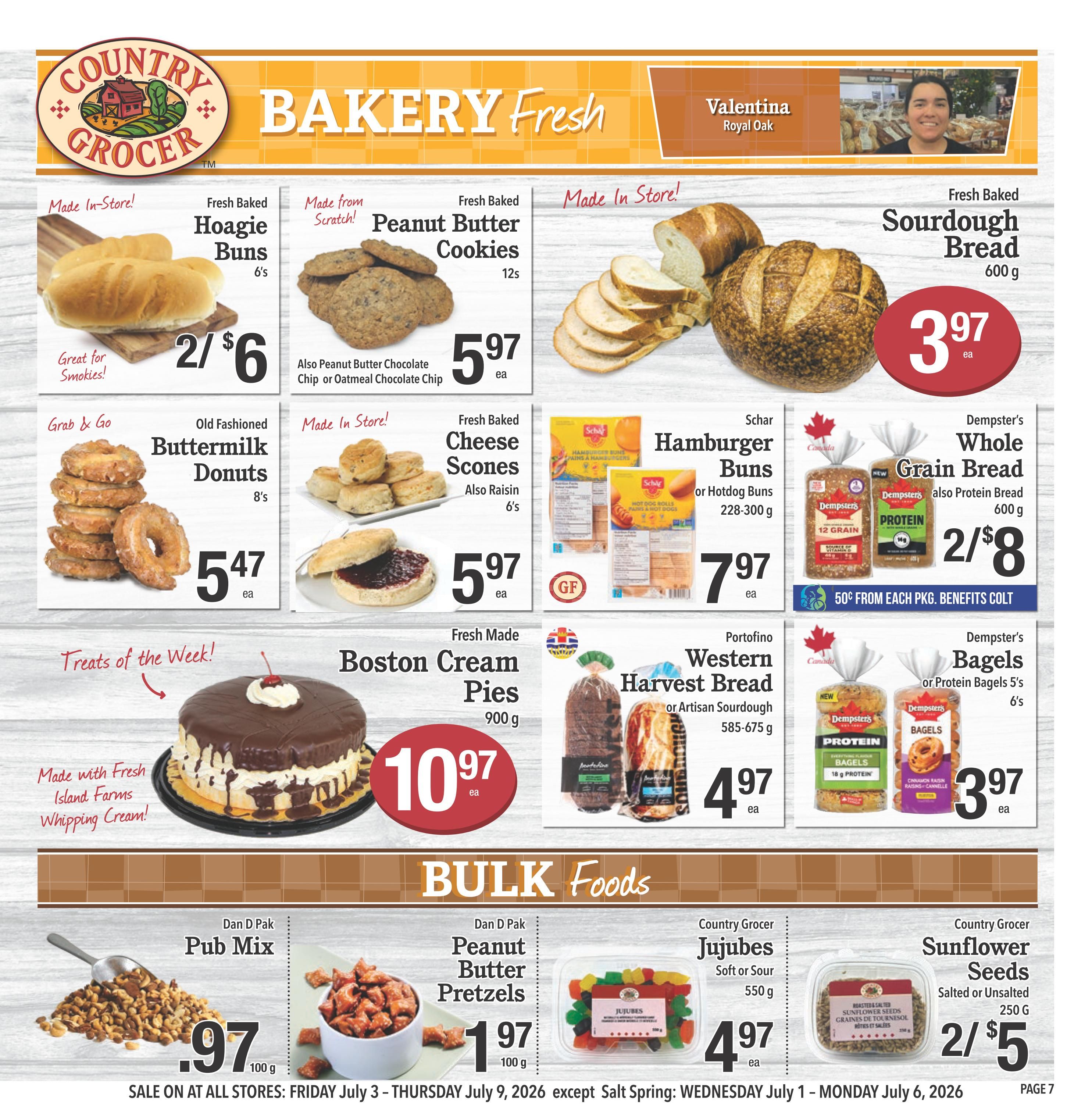 Country Grocer weekly flyer specials page 7 features a variety of bakery fresh items. Highlights include Fresh Baked Hoagie Buns at 2 for $6, Fresh Baked Peanut Butter Cookies for $5.97 each, and Fresh Baked Sourdough Bread for $3.97 each. Also available are Old Fashioned Buttermilk Donuts for $5.47 for an 8-pack, Fresh Baked Cheese Scones for $5.97 each, and Schar Hamburger Buns or Hotdog Buns for $7.97 per package. Dempster's Whole Grain Bread or Protein Bread is $8 for 2 packages, with a 50 cent donation from each package to Benefits Colt. For treats, a Fresh Made Boston Cream Pie is $10.97. Portofino Western Harvest Bread or Artisan Sourdough is $4.97. Dempster's Bagels or Protein Bagels (5's) are $3.97. The bulk foods section offers Dan D Pak Pub Mix for $0.97, Dan D Pak Peanut Butter Pretzels for $1.97 per 100g, Country Grocer Jujubes (Soft or Sour) for $4.97 per 550g, and Country Grocer Sunflower Seeds (Salted or Unsalted) for 2 for $5 per 250g. Sale dates are Friday July 3 to Thursday July 9, 2026, except for Salt Spring which is Wednesday July 1 to Monday July 6, 2026.