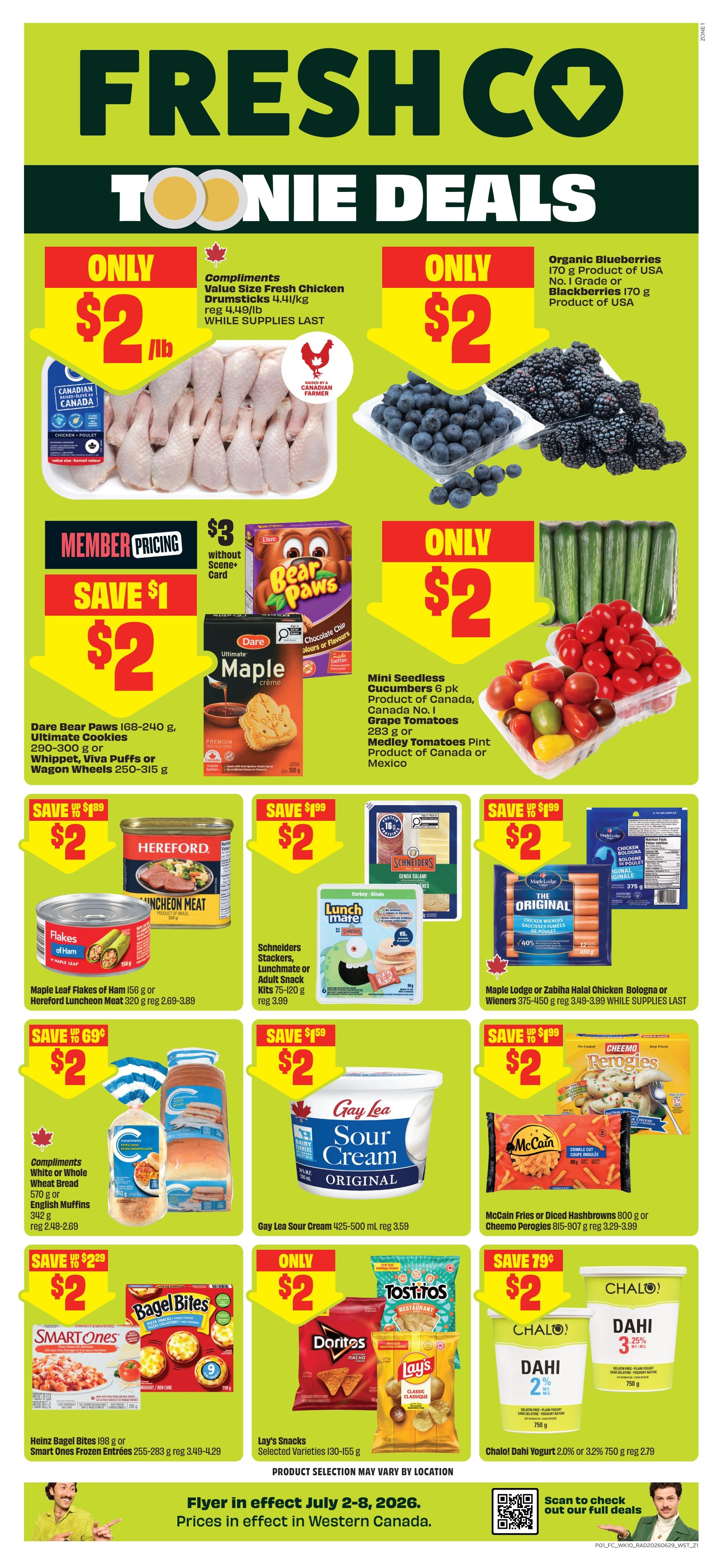FreshCo flyer page featuring Toonie Deals. Highlights include Compliments Value Size Fresh Chicken Drumsticks for $2/lb, and Organic Blueberries or Blackberries for $2. Member pricing offers Dare Bear Paws, Ultimate Cookies, Whippet, Viva Puffs, or Wagon Wheels for $2, a saving of $1. Also featured are Mini Seedless Cucumbers for $2, and Grape Tomatoes or Medley Tomatoes for $2. Other deals include Maple Leaf Flakes of Ham or Hereford Luncheon Meat for $2, Schneiders Stackers, Lunchmate or Adult Snack Kits for $2, and Maple Lodge or Zabiha Halal Chicken Bologna or Wieners for $2. Compliments White or Whole Wheat Bread or English Muffins are $2, and Gay Lea Sour Cream is $2. Heinz Bagel Bites or Smart Ones Frozen Entrees are $2. Lay's Snacks are $2. Chalo! Dahi Yogurt is $2. Prices are effective July 2-8, 2026, in Western Canada.