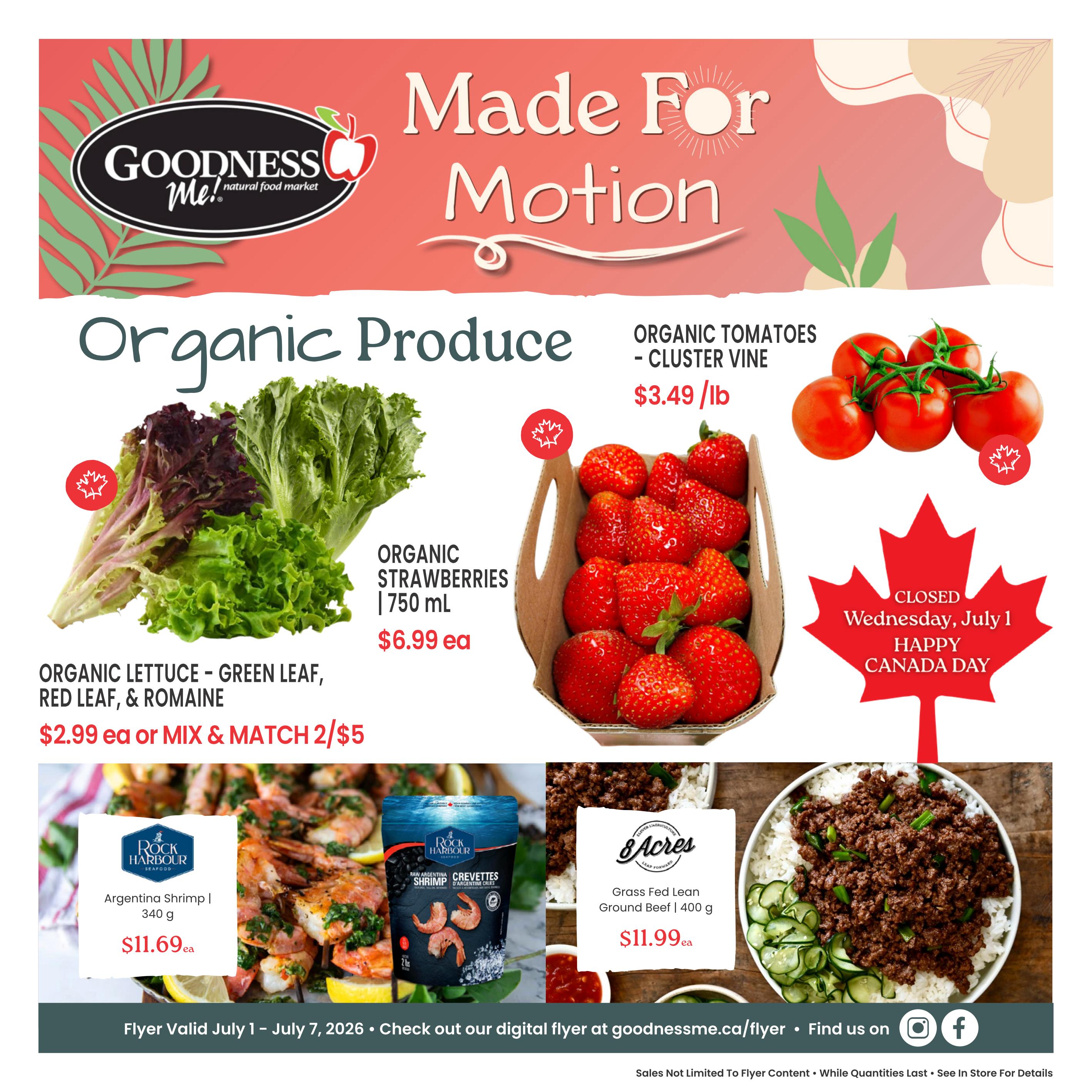 Goodness Me! flyer page featuring organic produce and seafood. Offers include Organic Lettuce (Green Leaf, Red Leaf, & Romaine) for $2.99 each or mix & match 2 for $5, Organic Strawberries (750 ml) for $6.99 each, and Organic Tomatoes - Cluster Vine for $3.49/lb. Also featured are Rock Harbour Argentina Shrimp (340 g) for $11.69 each and 8 Acres Grass Fed Lean Ground Beef (400 g) for $11.99 each. The flyer is valid from July 1 to July 7, 2026. Note: Store closed Wednesday, July 1 for Happy Canada Day.