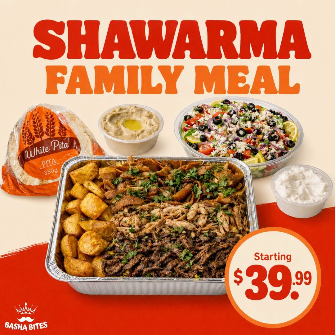 Basha Foods International flyer, page 11. Featuring the Shawarma Family Meal from Basha Bites, starting at $39.99. The meal includes a large platter with mixed shawarma (beef and chicken), potatoes, a bag of White Pita bread (350g), a container of hummus, a large salad with tomatoes, olives, and onions, and a side of garlic sauce.