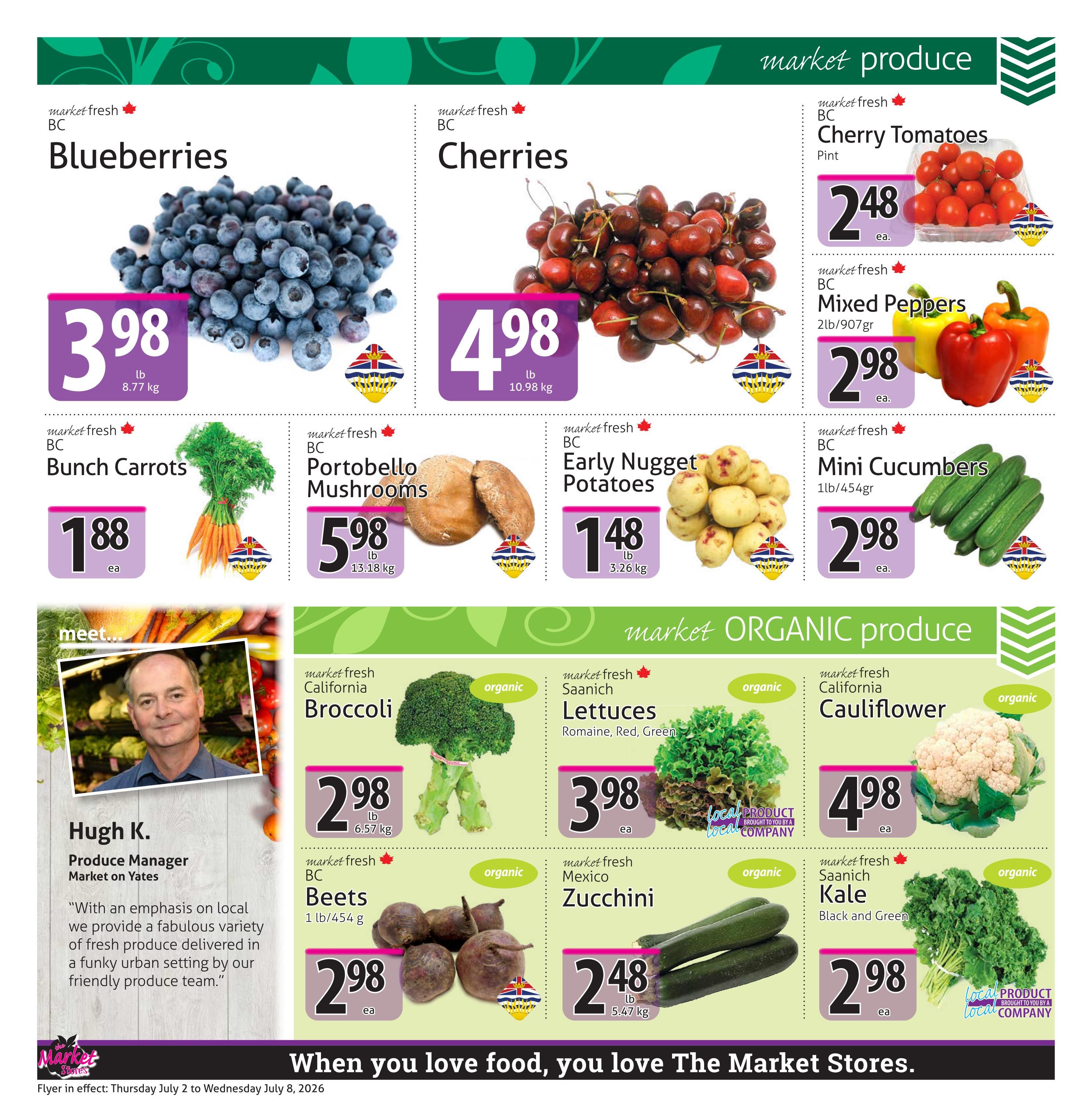 The Market Stores weekly flyer specials, page 2. Featured produce includes: Market Fresh BC Blueberries for $3.98/lb, Market Fresh BC Cherries for $4.98/lb, Market Fresh BC Cherry Tomatoes (pint) for $2.48 ea., Market Fresh BC Mixed Peppers for $2.98 ea., Market Fresh BC Bunch Carrots for $1.88 ea., Market Fresh BC Portobello Mushrooms for $5.98/lb, Market Fresh BC Early Nugget Potatoes for $1.48/lb, and Market Fresh BC Mini Cucumbers for $2.98 ea. The flyer also highlights Market Organic Produce: Market Fresh California Broccoli for $2.98 ea., Market Fresh Saanich Lettuces (Romaine, Red, Green) for $3.98 ea., Market Fresh California Cauliflower for $4.98 ea., Market Fresh BC Beets for $2.98 ea., Market Fresh Mexico Zucchini for $2.48/lb, and Market Fresh Saanich Kale (Black and Green) for $2.98 ea. Includes a photo and quote from Hugh K., Produce Manager at Market on Yates, discussing their emphasis on local produce.