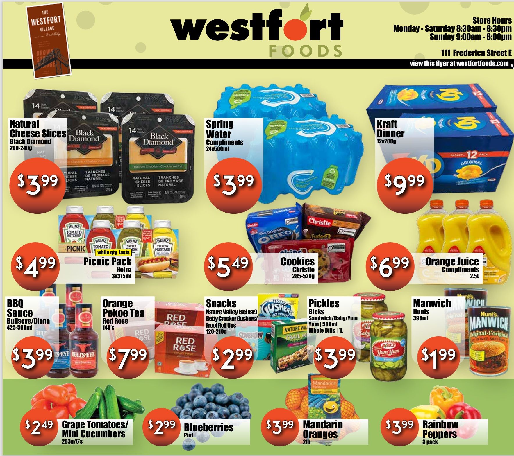 Westfort Foods weekly flyer specials page 1. Featured products include Black Diamond Natural Cheese Slices 200-240g for $3.99, Compliments Spring Water 24x500ml for $3.99, and Kraft Dinner 12x200g for $9.99. Also on sale are Heinz Picnic Pack 3x375ml for $4.99, Christie Cookies 285-520g for $5.49, and Compliments Orange Juice 2.5L for $6.99. Additional deals include Bullseye/Diana BBQ Sauce 425-500ml for $3.99, Red Rose Orange Pekoe Tea 140's for $7.99, Nature Valley, Betty Crocker Gushers, and Froot Roll Ups snacks for $2.99, Bicks Pickles Sandwich/Baby/Yum 500ml and Whole Dills 1L for $3.99, and Hunts Manwich 398ml for $1.99. Fresh produce includes Grape Tomatoes/Mini Cucumbers 283g/6's for $2.49, Blueberries Pint for $2.99, Mandarin Oranges 2lb for $3.99, and Rainbow Peppers 3 pack for $3.99.