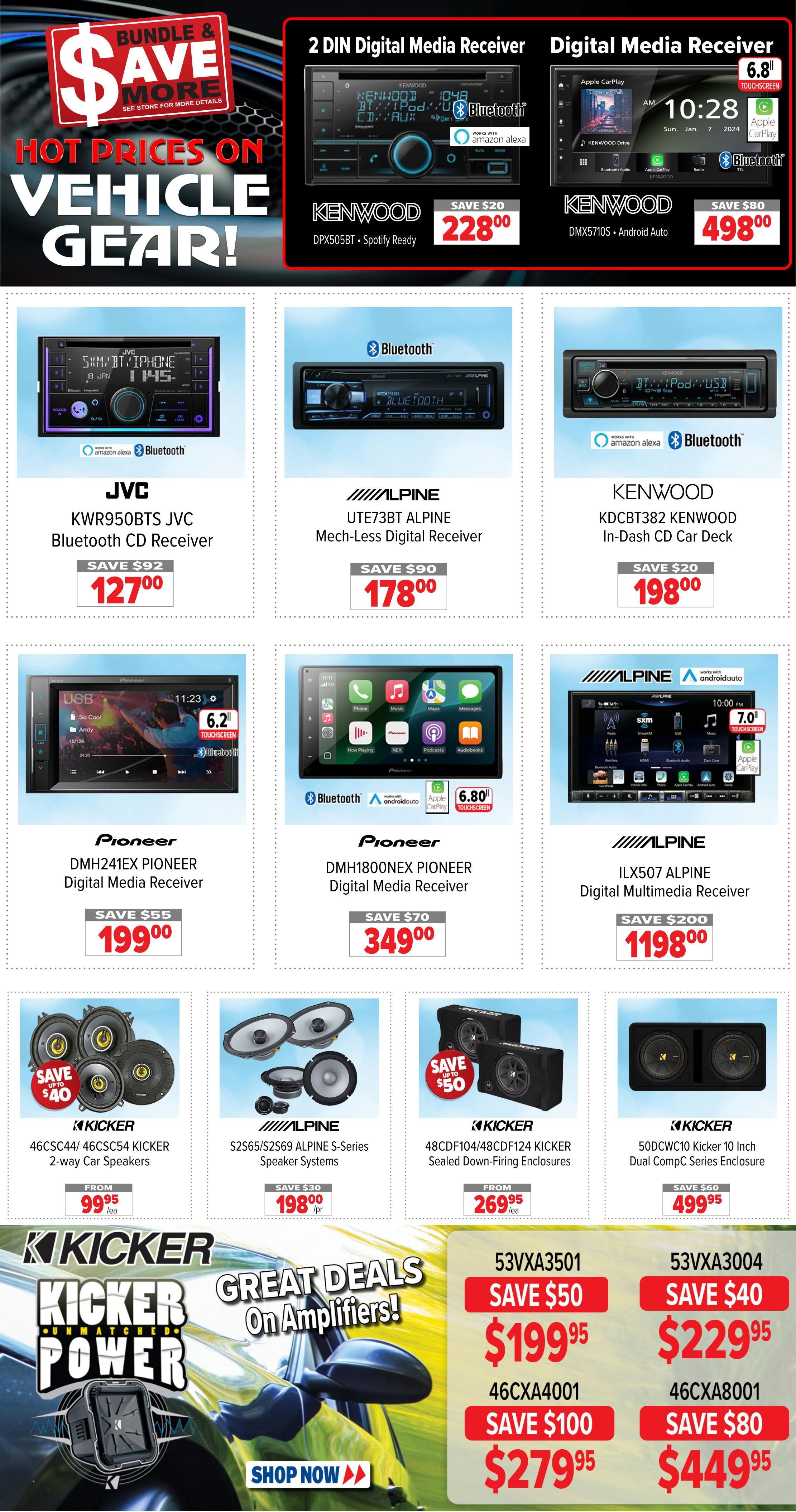 2001 Audio Video weekly flyer specials page 14 featuring hot prices on vehicle gear. Top row includes KENWOOD DPX505BT 2 DIN Digital Media Receiver for $228.00 (save $20) and KENWOOD DMX5710S Digital Media Receiver with 6.8' touchscreen for $498.00 (save $80). Second row features JVC KWR950BTS JVC Bluetooth CD Receiver for $127.00 (save $92), ALPINE UTE73BT ALPINE Mech-Less Digital Receiver for $178.00 (save $90), and KENWOOD KDCBT382 KENWOOD In-Dash CD Car Deck for $198.00 (save $20). Third row showcases PIONEER DMH241EX PIONEER Digital Media Receiver with 6.2' touchscreen for $199.00 (save $55), PIONEER DMH1800NEX PIONEER Digital Media Receiver with 6.80' touchscreen for $349.00 (save $70), and ALPINE ILX507 ALPINE Digital Multimedia Receiver with 7.0' touchscreen for $1198.00 (save $200). Bottom row displays KICKER 46CSC44/46CSC54 KICKER 2-way Car Speakers from $99.95 (save up to $40), ALPINE S2S65/S2S69 ALPINE S-Series Speaker Systems for $198.00 (save $30), KICKER 48CDF104/48CDF124 KICKER Sealed Down-Firing Enclosures from $269.95 (save up to $50), and KICKER 50DCWC10 Kicker 10 Inch Dual Compc Series Enclosure for $499.95 (save $60). The bottom section highlights KICKER Power with great deals on amplifiers, including models 53VX A3501 for $199.95 (save $50) and $279.95 (save $100), and 53VX A3004 for $229.95 (save $40) and $449.95 (save $80).