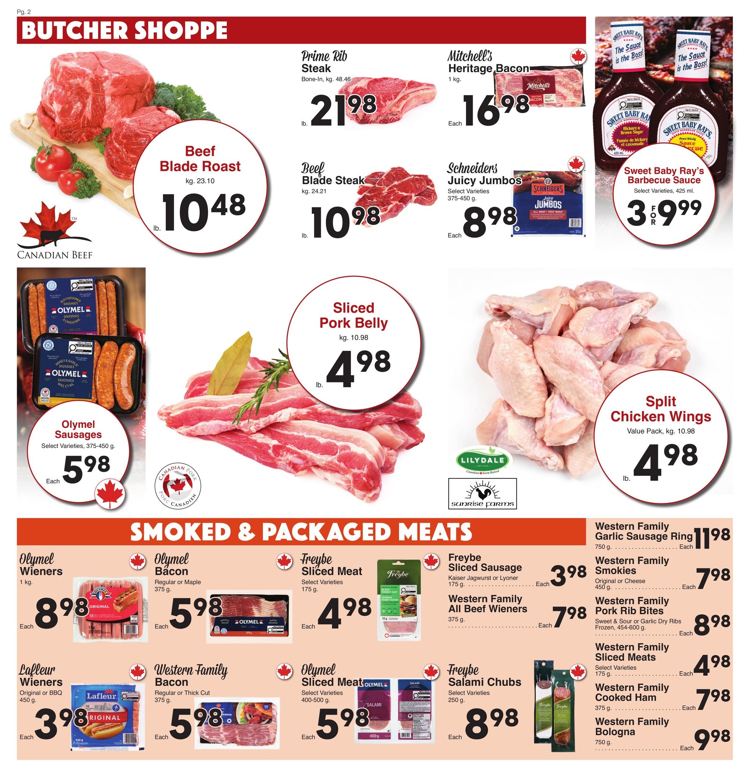 AG Foods Weekly Flyer Specials, Page 2: Butcher Shoppe section featuring Canadian Beef Blade Roast at $10.48/lb. Also available are Prime Rib Steak for $21.98/lb, Mitchell's Heritage Bacon for $16.98 each, Schneiders Juicy Jumbos for $8.98 each, and Sweet Baby Ray's Barbecue Sauce in select varieties for $3.99 each. Sliced Pork Belly is $4.98/lb and Lilydale Split Chicken Wings are $4.98/lb. Smoked & Packaged Meats include Olymel Wieners for $8.98 each, Lafleur Wieners Original or BBQ for $3.98 each, Olymel Bacon Regular or Maple for $5.98 each, Western Family Bacon Regular or Thick Cut for $5.98 each. Freybe Sliced Meat is $4.98 each, Freybe Sliced Sausage is $3.98 each, Western Family All Beef Wieners are $7.98 each, Olymel Sliced Meat for $5.98 each, Freybe Salami Chubs for $8.98 each. Additionally, Western Family Garlic Sausage Ring is $11.98 each, Western Family Smokies for $7.98 each, Western Family Pork Rib Bites for $8.98 each, Western Family Sliced Meats for $4.98 each, Western Family Cooked Ham for $7.98 each, and Western Family Bologna for $9.98 each.