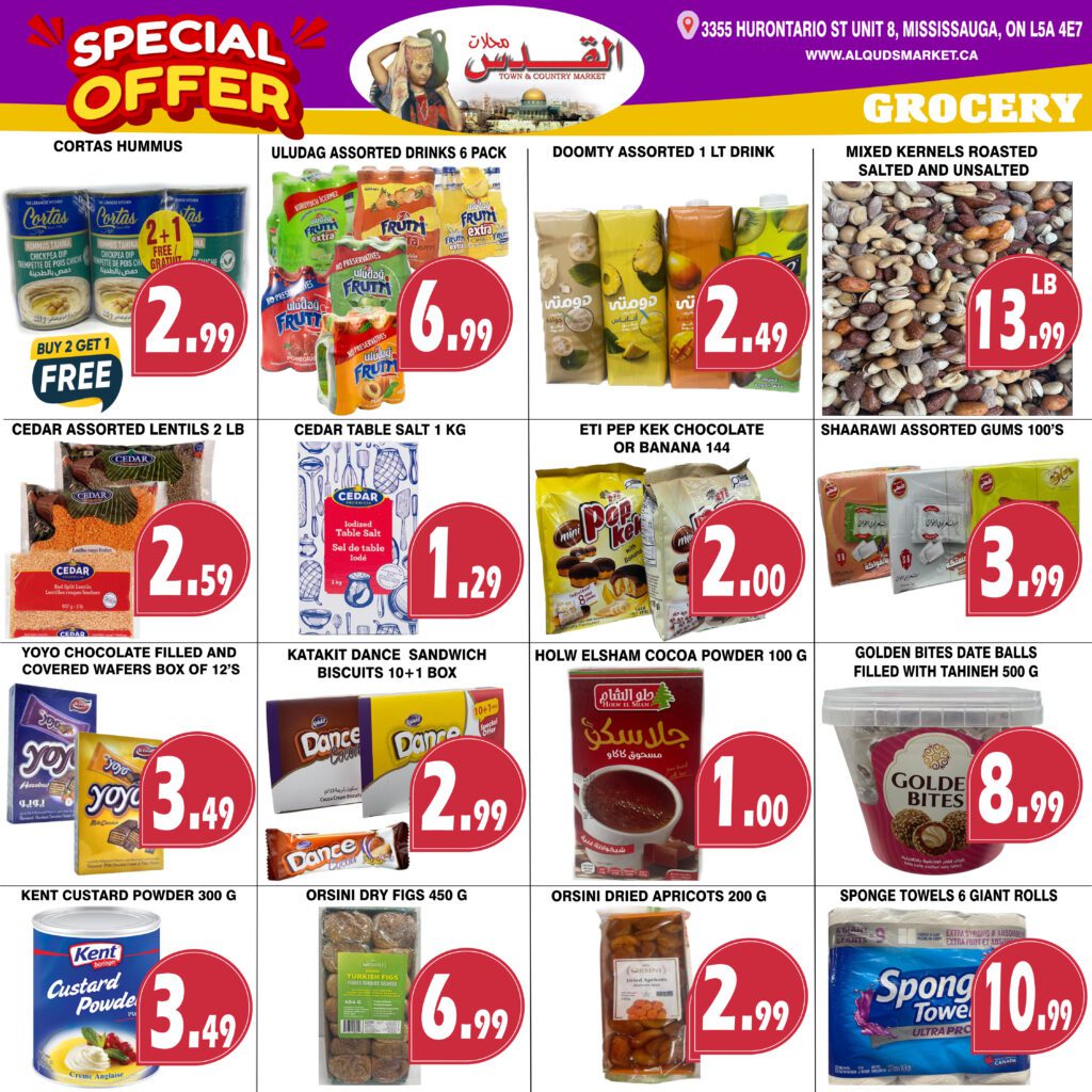 Al-Quds Market weekly flyer specials page 5. Featured grocery items include Cortas Hummus with a Buy 2 Get 1 Free offer for $2.99, Uludag Assorted Drinks 6 pack for $6.99, Doomty Assorted 1 Lt Drinks for $2.49, and Mixed Kernels Roasted Salted and Unsalted for $13.99 per pound. Also available are Cedar Assorted Lentils 2 lb for $2.59, Cedar Table Salt 1 kg for $1.29, Eti Pep Kek Chocolate or Banana 144 count for $2.00, and Shaarawi Assorted Gums 100's for $3.99. Additional offers include Yoyo Chocolate Filled and Covered Wafers Box of 12's for $3.49, Katakit Dance Sandwich Biscuits 10+1 Box for $2.99, Holw Elsham Cocoa Powder 100 g for $1.00, and Golden Bites Date Balls Filled with Tahini 500 g for $8.99. Finally, Kent Custard Powder 300 g is $3.49, Orsini Dry Figs 450 g is $6.99, Orsini Dried Apricots 200 g is $2.99, and Sponge Towels 6 Giant Rolls are $10.99.