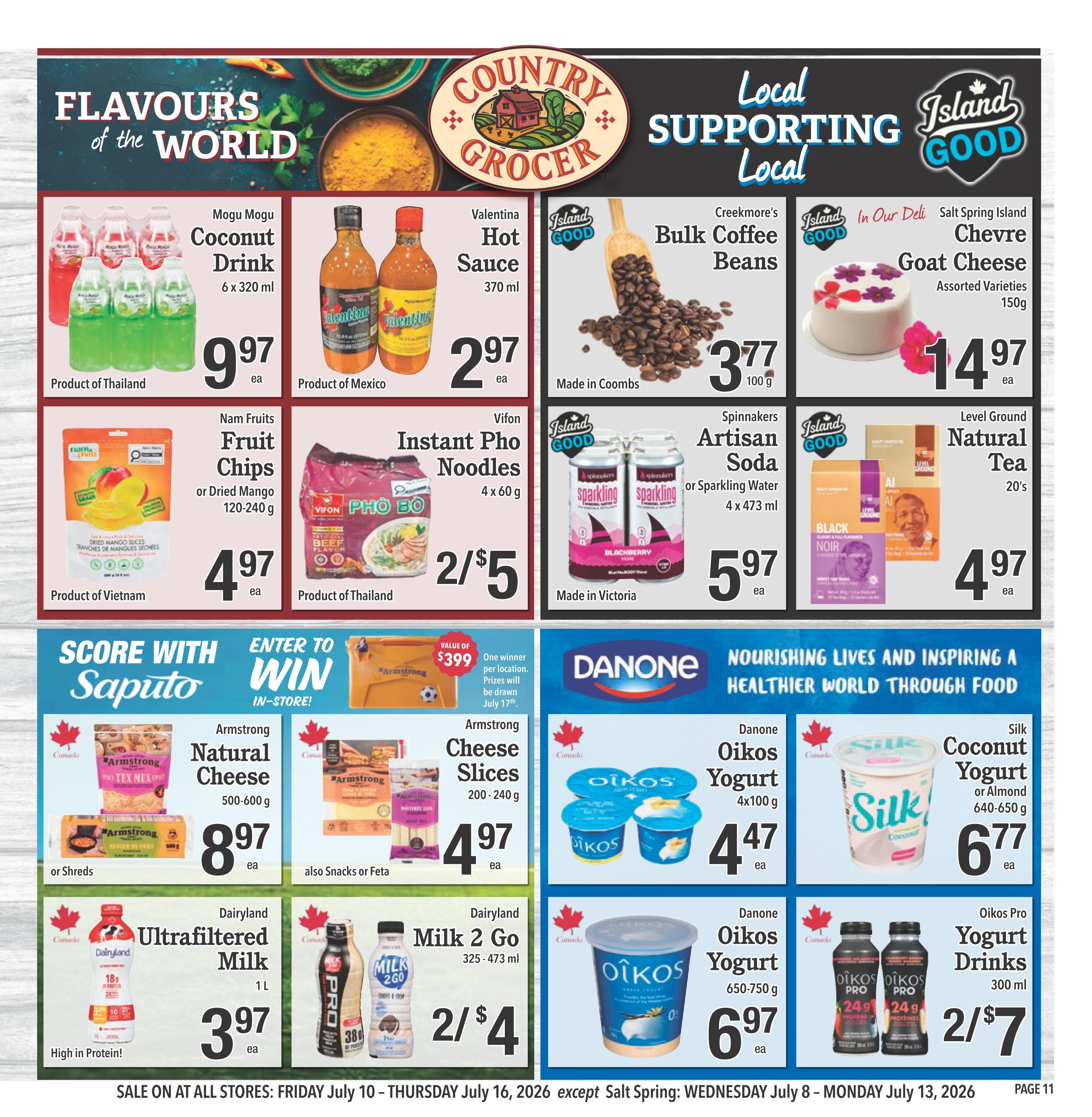 Country Grocer weekly flyer specials page 11 features 'Flavours of the World' and 'Local Supporting Local' sections. Featured products include Mogu Mogu Coconut Drink 6 x 320 ml for $9.97, Valentina Hot Sauce 370 ml for $2.97, Creekmore's Bulk Coffee Beans 100 g for $3.77, and Salt Spring Island Chevre Goat Cheese assorted varieties 150g for $14.97. Also available are Nam Fruits Fruit Chips or Dried Mango 120-240 g for $4.97, Vifon Instant Pho Noodles 4 x 60 g for 2/$5, and Spinnaker's Artisan Soda or Sparkling Water 4 x 473 ml for $5.97. Level Ground Natural Tea 20's is priced at $4.97. The 'Score with Saputo' section highlights Armstrong Natural Cheese 500-600 g for $8.97, and Armstrong Cheese Slices 200-240 g for $4.97. Dairyland Ultrafiltered Milk 1 L is $3.97, and Dairyland Milk 2 Go 325-473 ml is 2/$4. Danone Oikos Yogurt 4x100g is $4.47, and Danone Oikos Yogurt 650-750g is $6.97. Silk Coconut Yogurt or Almond 640-650g is $6.77. Oikos Pro Yogurt Drinks 300 ml are 2/$7. A contest is also featured with prizes drawn July 17th.
