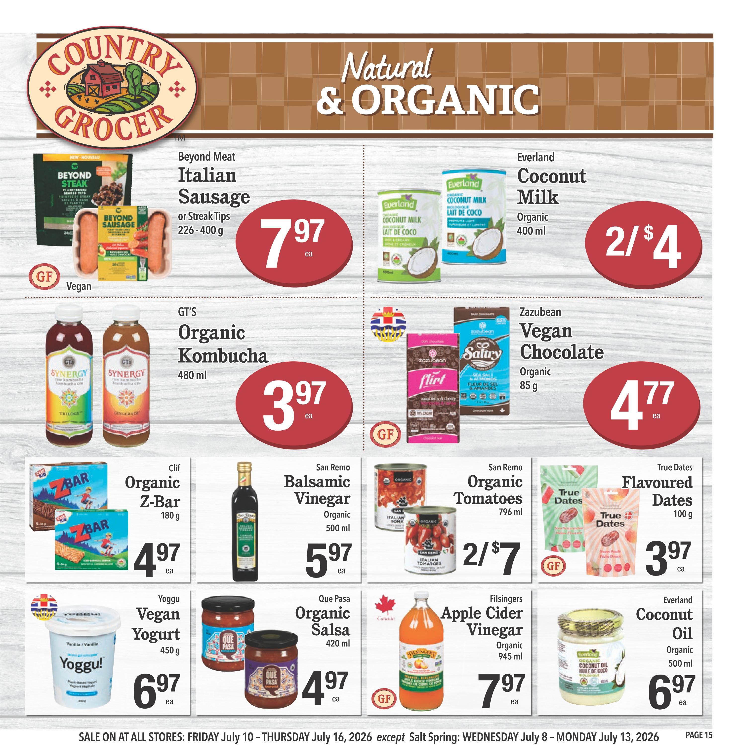 Country Grocer weekly flyer specials page 15 featuring natural and organic products. Offers include Beyond Meat Italian Sausage or Streak Tips for $7.97, Everland Coconut Milk for 2 for $4, GT's Organic Kombucha for $3.97, Zazubean Vegan Chocolate for $4.77, Clif Organic Z-Bar for $4.97, San Remo Organic Balsamic Vinegar for $5.97, San Remo Organic Tomatoes for 2 for $7, True Dates Flavoured Dates for $3.97, Yoggu Vegan Yogurt for $6.97, Que Pasa Organic Salsa for $4.97, Ffisingers Apple Cider Vinegar for $7.97, and Everland Coconut Oil for $6.97. Sale runs from Friday July 10 to Thursday July 16, 2026, with an exception for Salt Spring from Wednesday July 8 to Monday July 13, 2026.