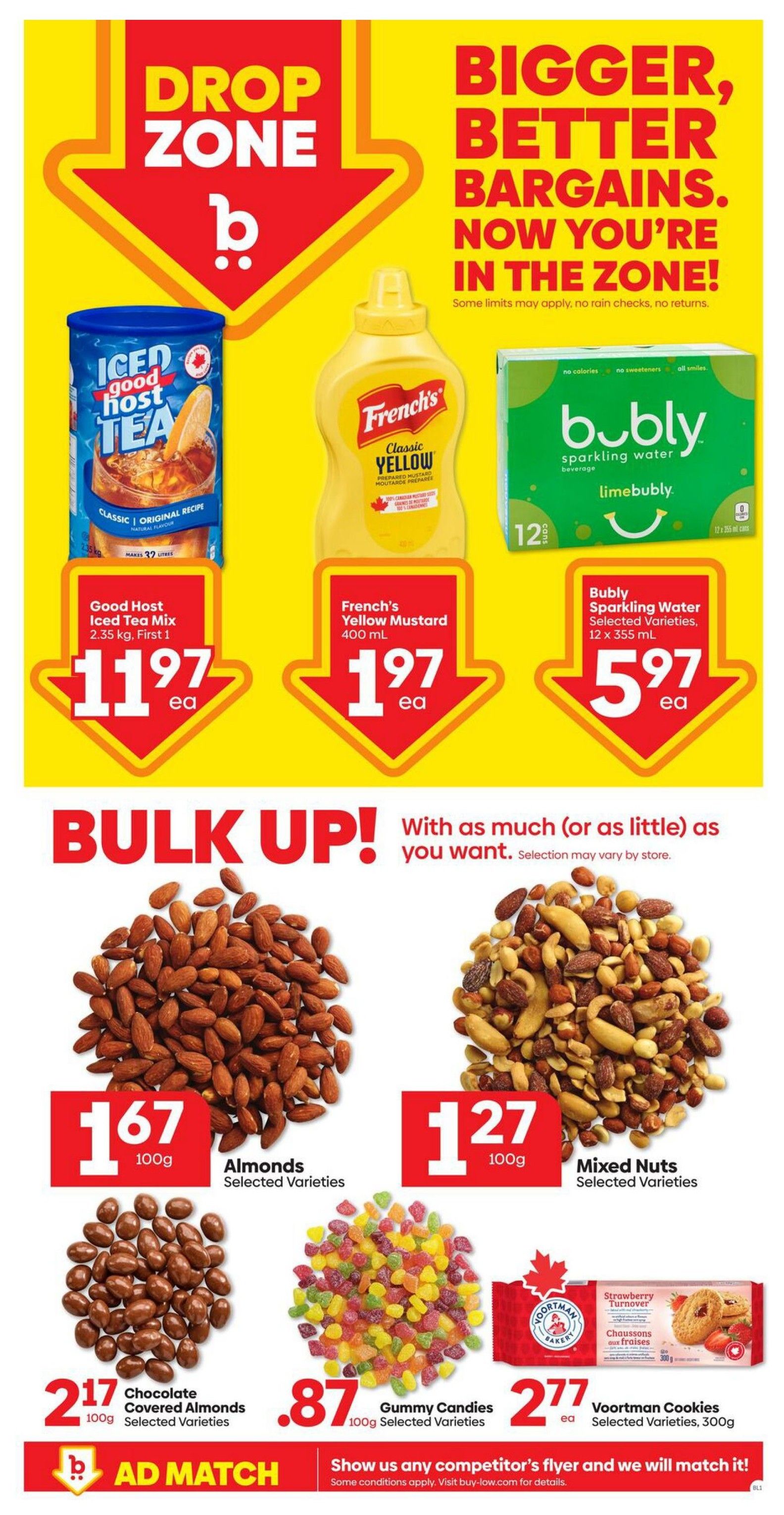 Buy-Low Foods Alberta weekly flyer specials page 8 features a 'Drop Zone' with Bigger, Better Bargains. Featured items include Good Host Iced Tea Mix, 2.35 kg, for $11.97 each; French's Classic Yellow Mustard, 400 mL, for $1.97 each; and Bubly Sparkling Water, Limebubly flavour, 12 x 355 mL cans, for $5.97 each. The flyer also highlights 'Bulk Up!' deals with selection varying by store. Options include Almonds, Selected Varieties, for $1.67 per 100g; Mixed Nuts, Selected Varieties, for $1.27 per 100g; Chocolate Covered Almonds, Selected Varieties, for $2.17 per 100g; Gummy Candies, Selected Varieties, for $0.87 per 100g; and Voortman Cookies, Selected Varieties, 300g, for $2.77 each. The page also includes an 'Ad Match' guarantee.