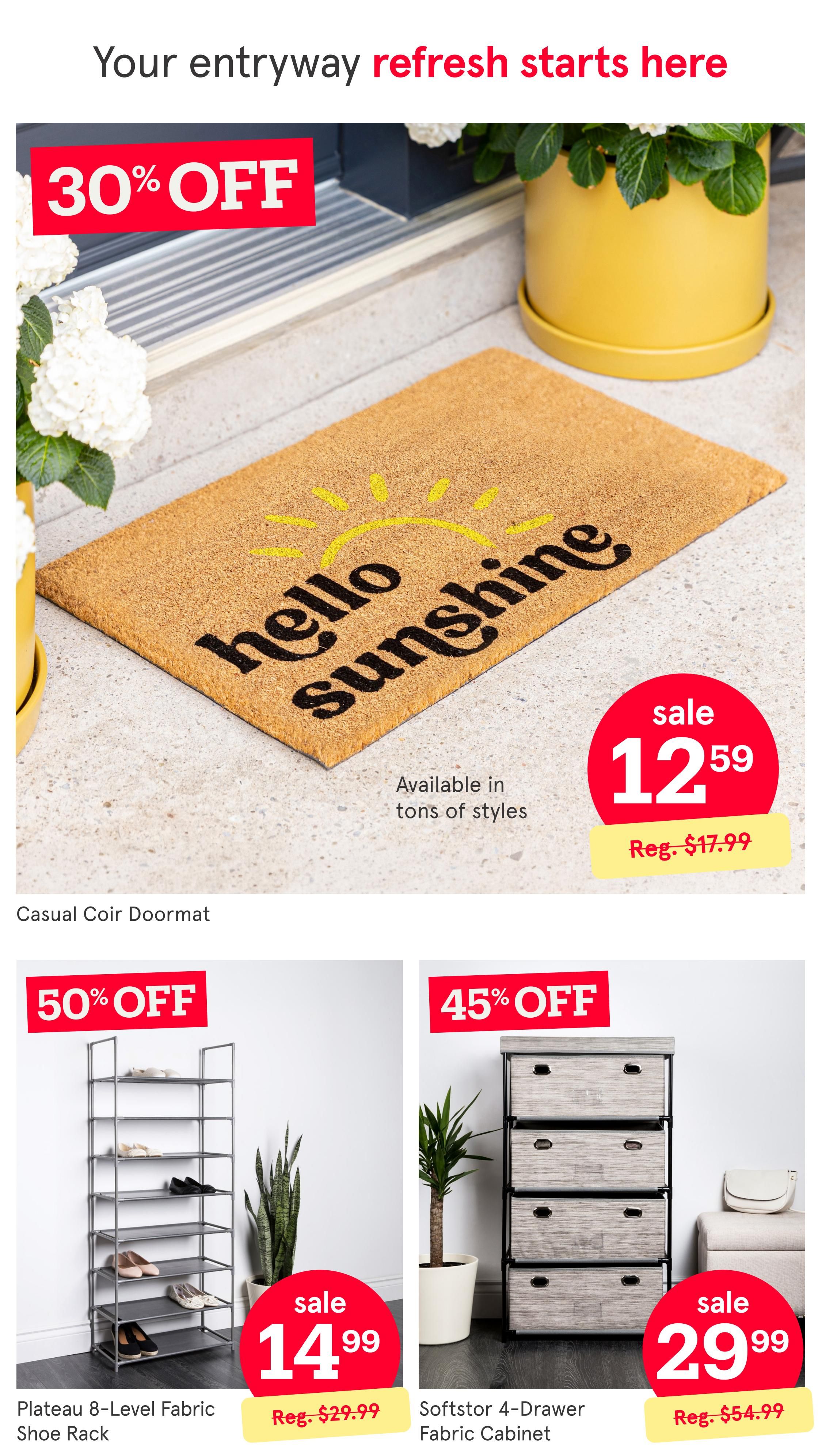 Kitchen Stuff Plus flyer page 3 featuring entryway refresh deals. A Casual Coir Doormat with a 'hello sunshine' design is on sale for $12.59, down from $17.99, with 30% off. Also available are a Plateau 8-Level Fabric Shoe Rack on sale for $14.99 (regularly $29.99), offering 50% off, and a Softstor 4-Drawer Fabric Cabinet on sale for $29.99 (regularly $54.99), with 45% off.