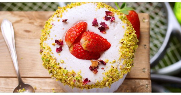 Strawberry souffle? with a crunchy pistachio topping