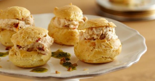 Goat Cheese and Sun Dried Tomato Profiteroles with Herb Oil