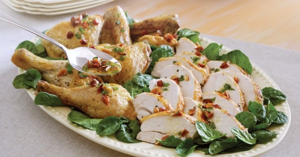 Roasted Chicken with Almond Mint Sauce Over Spinach