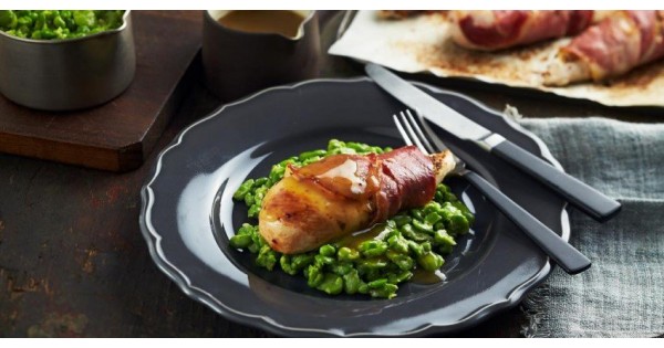 Prosciutto Wrapped Chicken On Smashed Broadbeans With Gravy