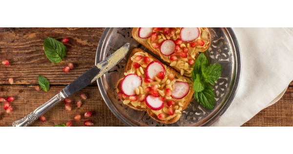 Hummus Radish and Pomegranate Toasts