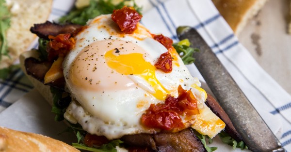 Bacon Egg and Arugula Breakfast Sandwich on Ciabatta Bread