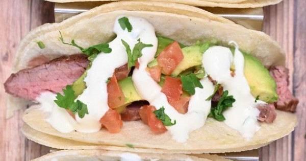Grilled Flank Steak Tacos with Avocado and Cilantro Lime Crema
