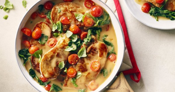 Saucy Pork Chops with Spinach and Tomatoes