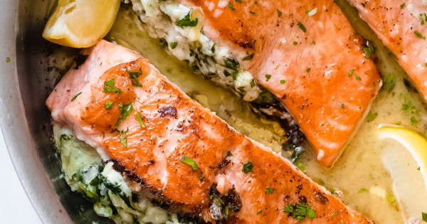 Creamy Spinach Artichoke Stuffed Salmon with Lemon Butter Sauce