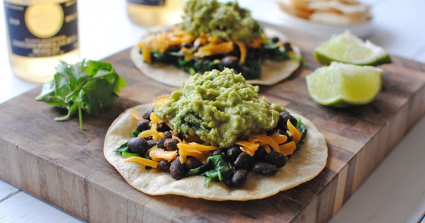 Easy Spinach, Black Bean and Guacamole Tostadas