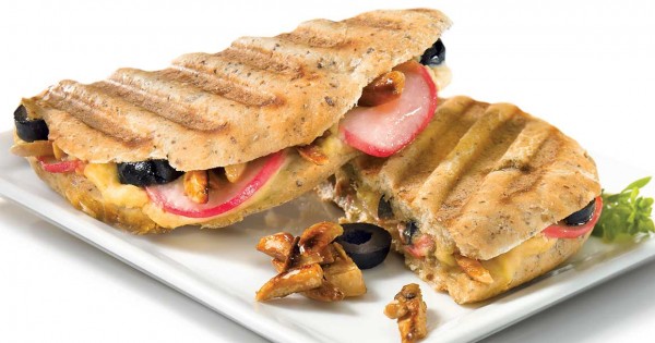 Hummus and caramelized almond sandwich