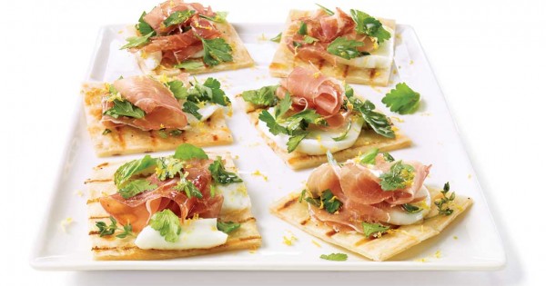 Prosciutto and mozzarella pizza, hot off the grill